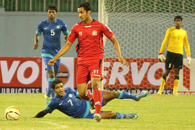 Afghanistan's Sandjar Ahmadi in action against India in SAFF Cup