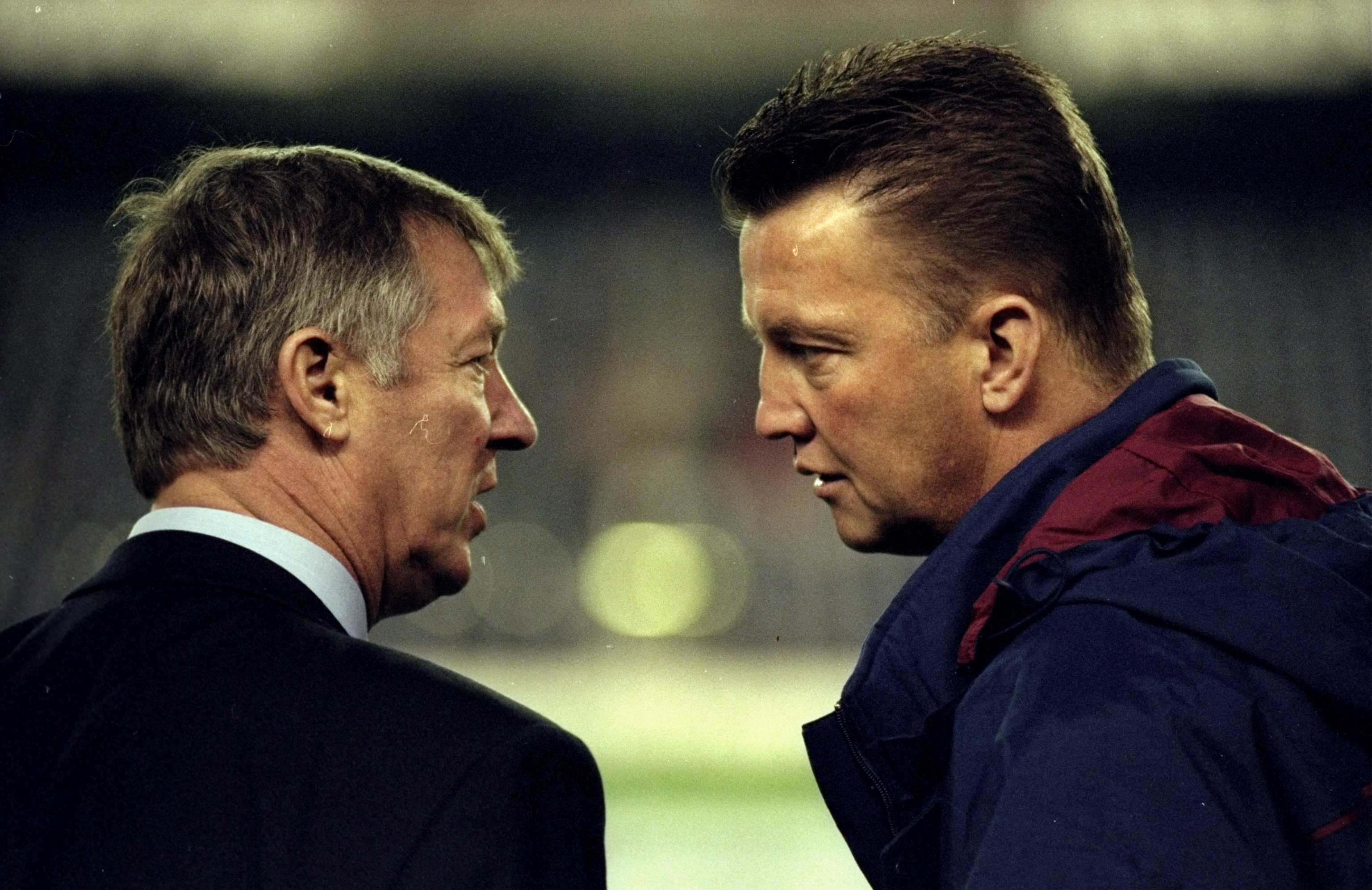 25 Nov 1998: Manchester United manager Alex Ferguson comes face to face with Barcelona coach Louis van Gaal in the UEFA Champions League match at the Nou Camp in Barcelona, Spain. The game ended 3-3. Mandatory Credit: Shaun Botterill /Allsport