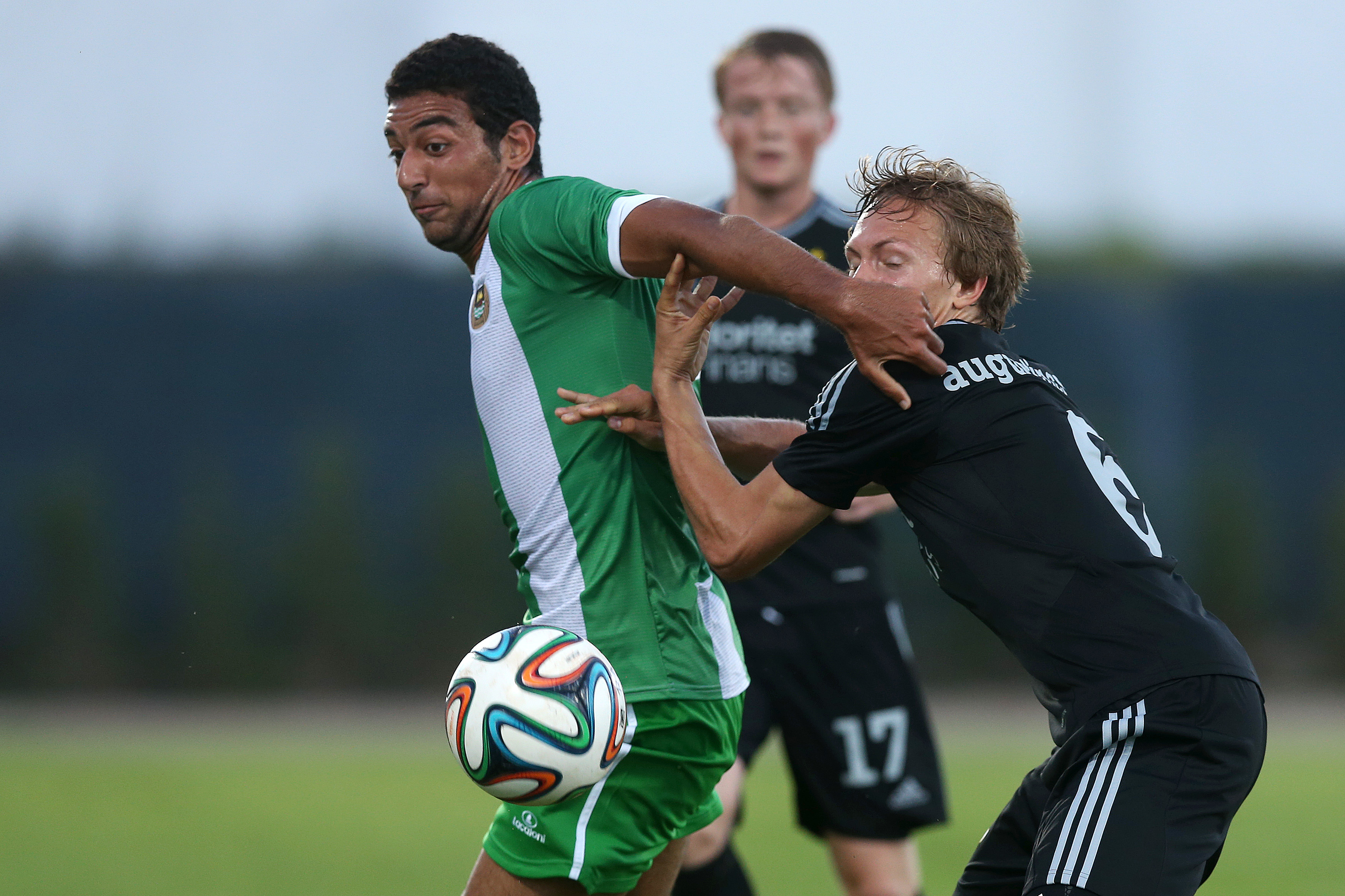 epa04344813 Rio Ave's Hassan (L) in action against Ludwig Augustinsson of IFK Goteborg during their UEFA Europa League second leg of third qualifying round match, at Arcos stadium, Vila do Conde, Portugal, 07 August 2014. EPA/JOSE COELHO