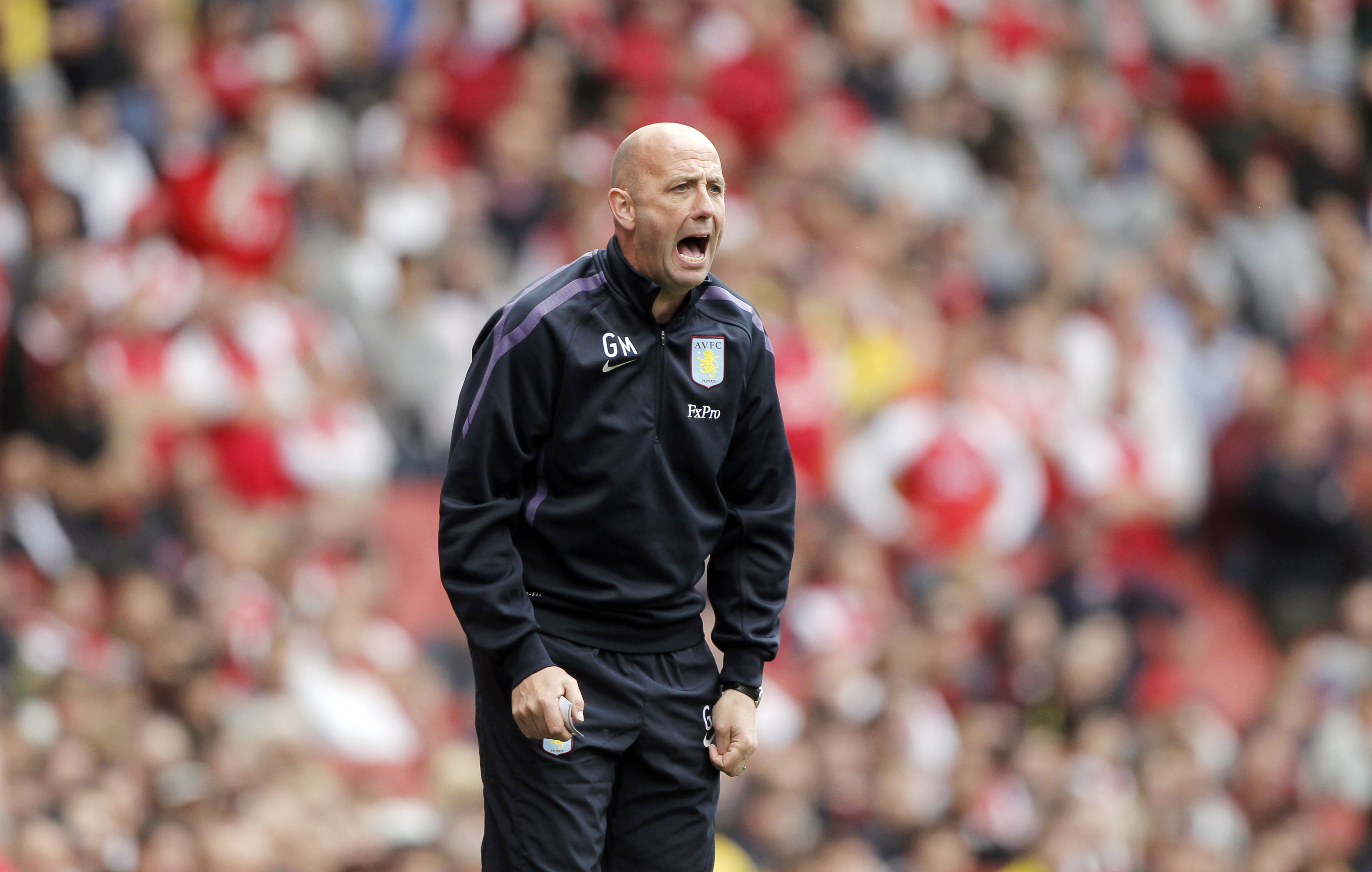 epa02734837 Aston Villa's assistant manager Gary McAllister reacts during the English Premier League soccer match between Arsenal and Aston Villa at Emirates Stadium in London, Britain, 15 May 2011. Aston Villa beat Arsenal 2-1.  EPA/KERIM OKTEN NO ONLINE/INTERNET USE WITHOUT A LICENSE FROM FOOTBALL DATA CO.LTD.