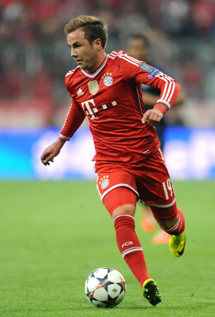 epa04160840 Munich's Mario Gotze in action during the UEFA Champions League quarter-final second leg soccer match between Bayern Munich and Manchester United in Munich, Germany, 09 April 2014. EPA/ANDREAS GEBERT