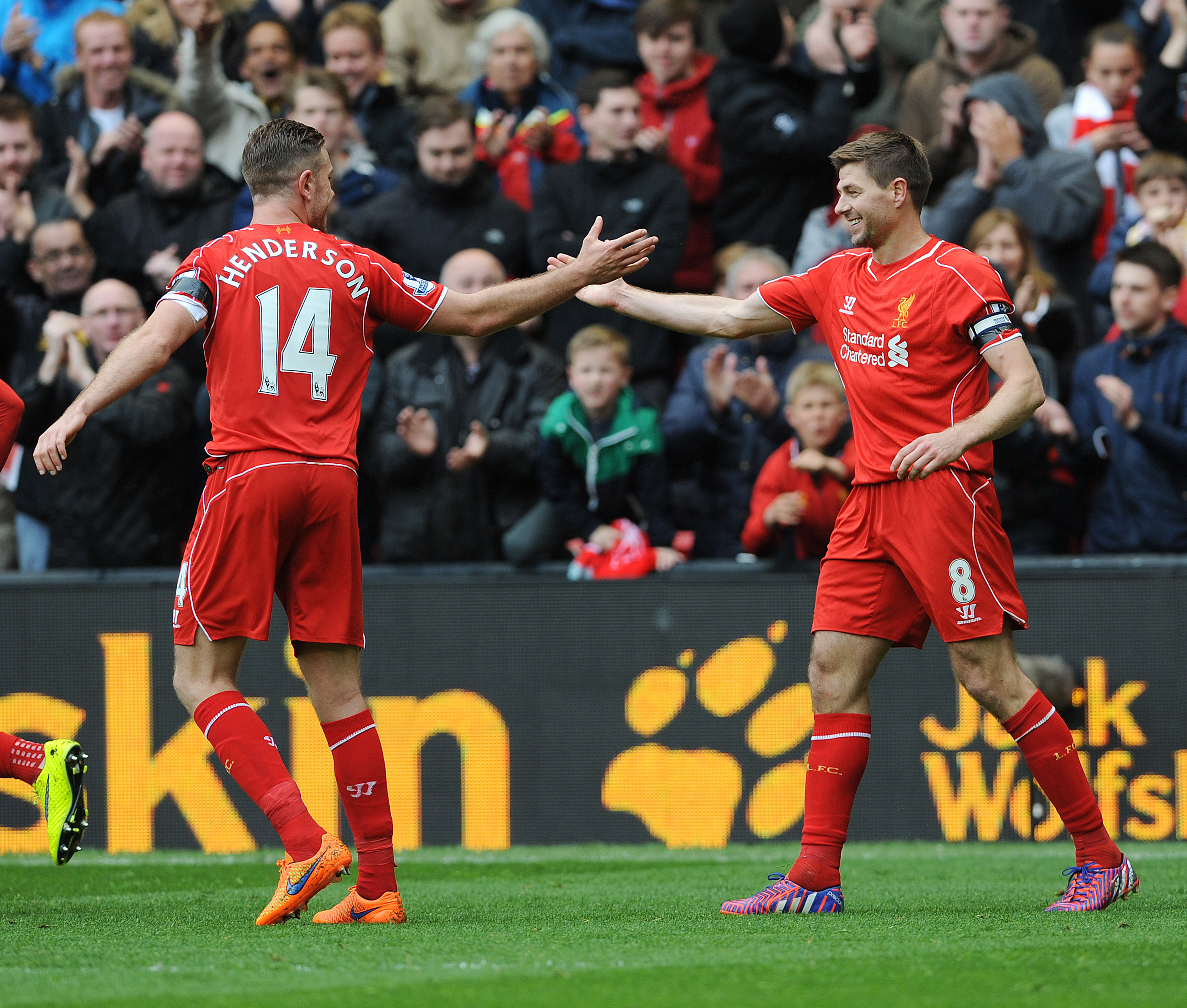 epa04730269 Liverpool's Jordan Henderson (L) congratulates Steven Gerrard (R) reacts after scoring the winning goal during the English Premier League soccer match between Liverpool and Queens Park Rangers at the Anfield in Liverpool, Britain, 02 May 2015. EPA/PETER POWELL DataCo terms and conditions apply
http://www.epa.eu/files/Terms%20and%20Conditions/DataCo_Terms_and_Conditions.pdf