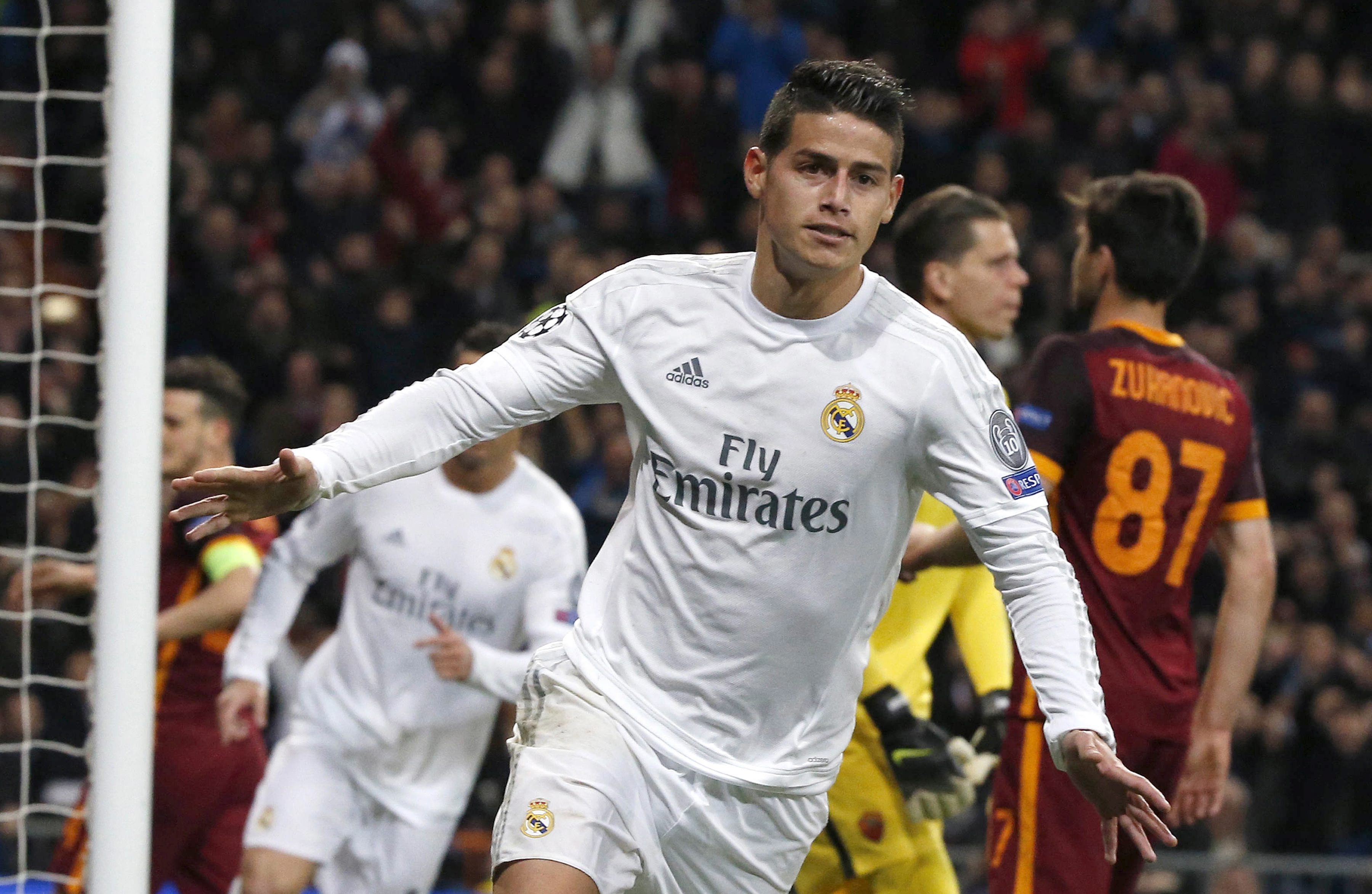 Real Madrid's Colombian midfielder James Rodriguez jublates his goal against AS Roma during their Champions League round of 16 second leg match played at Santiago Bernabeu stadium in Madrid, Spain, 08 March 2016. (Photo by Kiko Huesca/EPA)