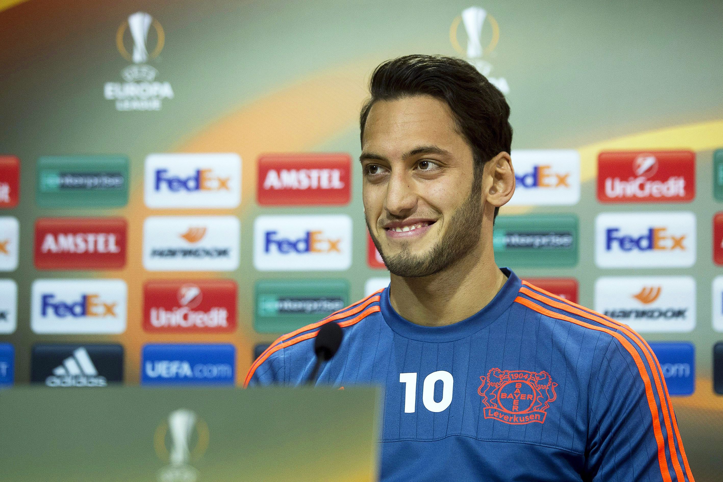 epa05203314 Bayer Leverkusen's Turkish forward Hakan Calhanoglu attends a press conference at El Madrigal stadium in Castellon, eastern Spain, 09 March 2016. Bayer Leverkusen will face Villarreal CF in the UEFA Europa League round of 16, first leg soccer match on 10 March 2016. EPA/DOMENECH CASTELLO