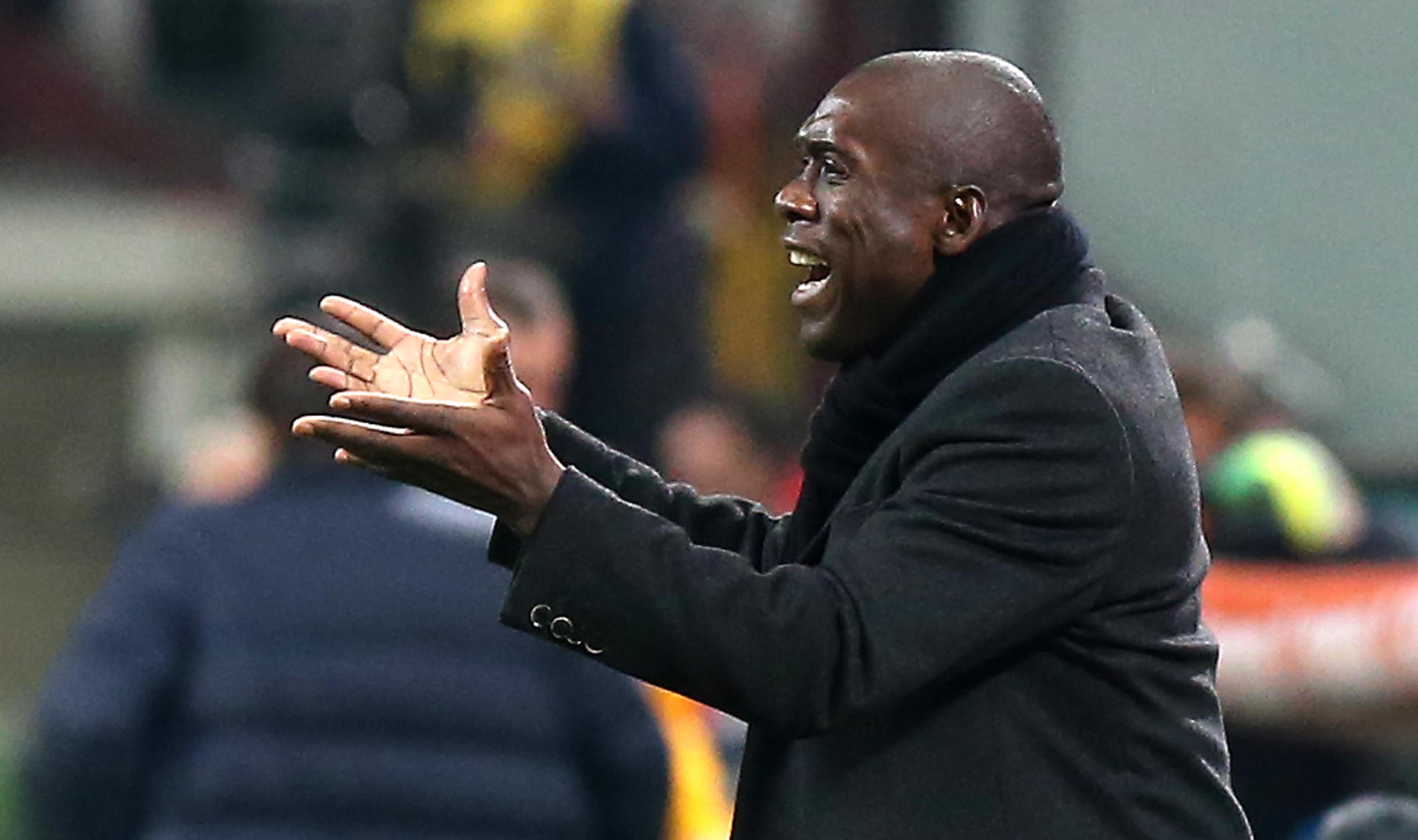 epa04106707 AC Milan head coach Clarence Seedorf gestures the Italian Serie A soccer match beetwen AC Milan and Juventus FC at Giuseppe Meazza Stadium in Milan, Italy, 02 March 2014. EPA/MATTEO BAZZI