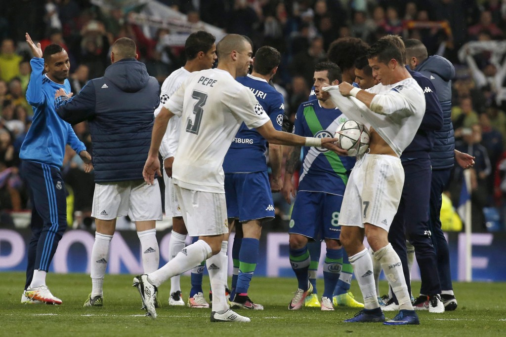 Cristiano Ronaldo seems to be enjoying himself at the Santiago Bernabeu and is reportedly set to hold talks to extend his contract. (Picture Courtesy - AFP/Getty Images)