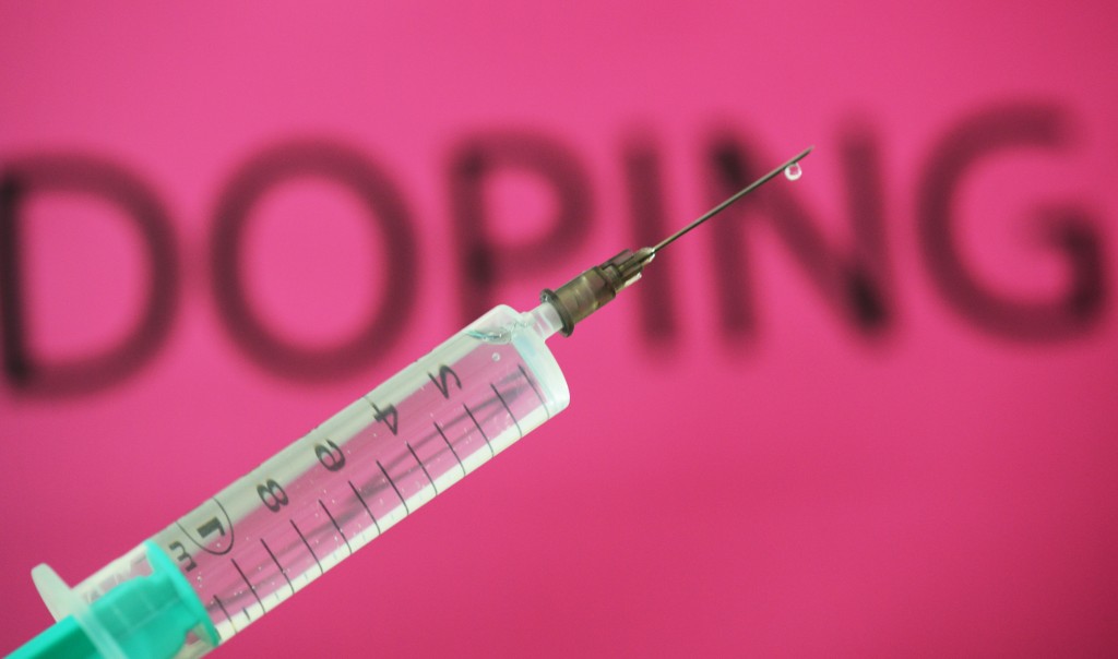 epa05242086 A picture made available on 03 April 2016 shows an injection in front of the word 'Doping' in Freiburg, Germany, on 02 March 2016. According to a research of German TV channel WDR and the British newspaper 'Sunday Times', gynaecologist Mark Bonar from London is said to have given 150 top athletes access to drugs over the past six years. His group of clients is said to include professional soccer players of the soccer clubs FC Arsenal, FC Chelsea and Leicester City, currently leading the Premiere League, as well as participants of the Tour de France, boxers and tennis players. EPA/PATRICK SEEGER