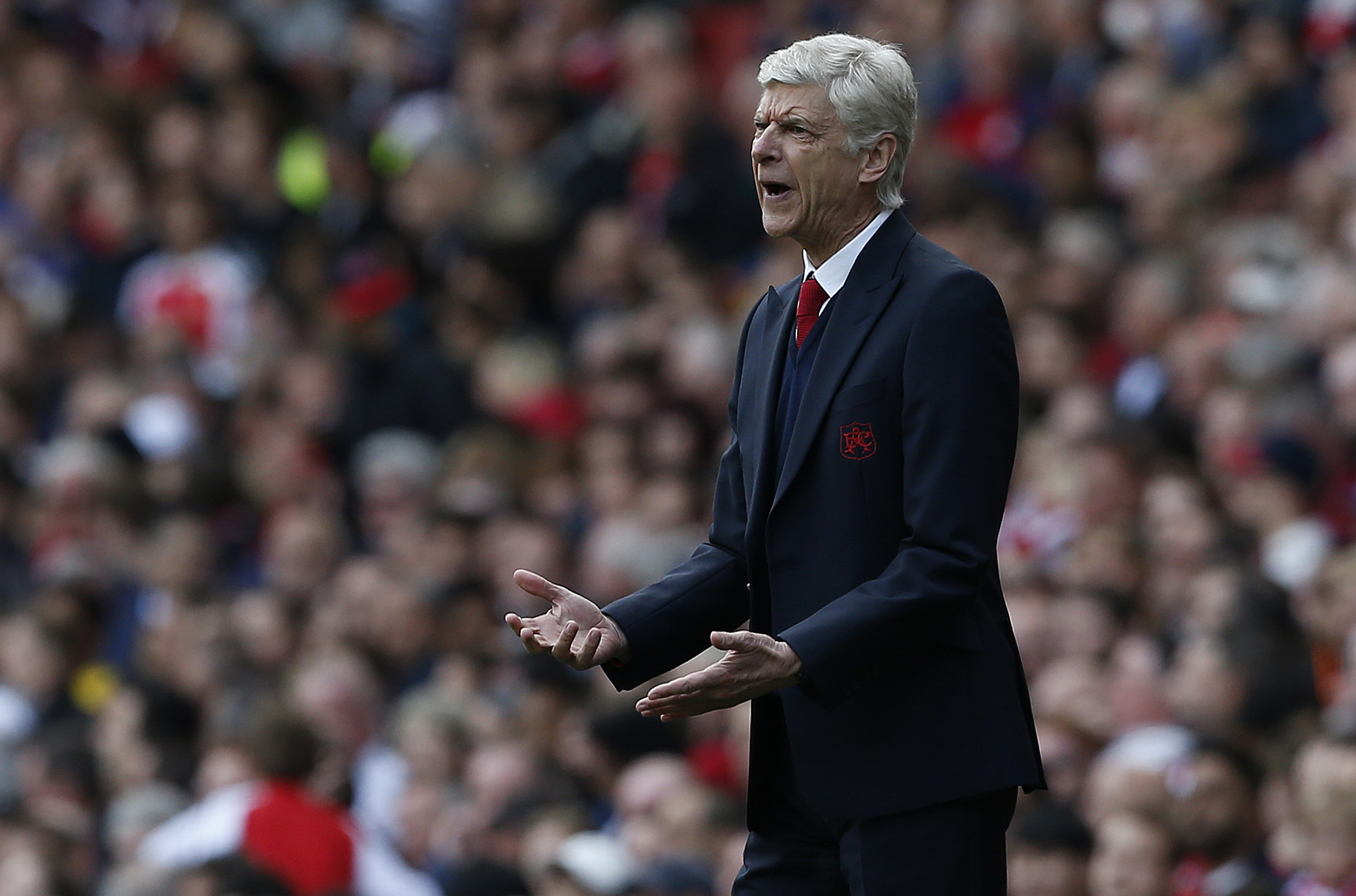 Arsenal's French manager Arsene Wenger shouts instructions to his players from the touchline during the English Premier League football match between Arsenal and Aston Villa at the Emirates Stadium in London on May 15, 2016. / AFP / IAN KINGTON / RESTRICTED TO EDITORIAL USE. No use with unauthorized audio, video, data, fixture lists, club/league logos or 'live' services. Online in-match use limited to 75 images, no video emulation. No use in betting, games or single club/league/player publications. / (Photo credit should read IAN KINGTON/AFP/Getty Images)
