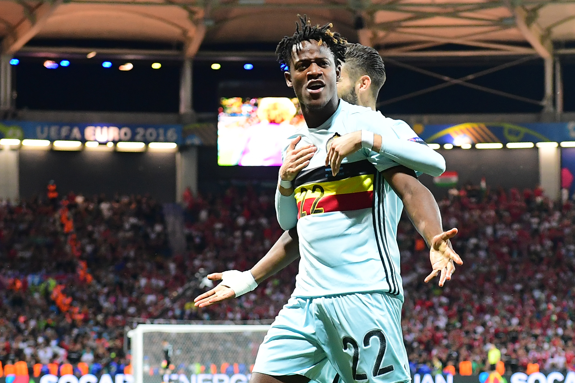 Belgium's forward Michy Batshuayi (L) celebrates after scoring his team's second goal during the Euro 2016 round of 16 football match between Hungary and Belgium at the Stadium Municipal in Toulouse on June 26, 2016. / AFP / EMMANUEL DUNAND (Photo credit should read EMMANUEL DUNAND/AFP/Getty Images)