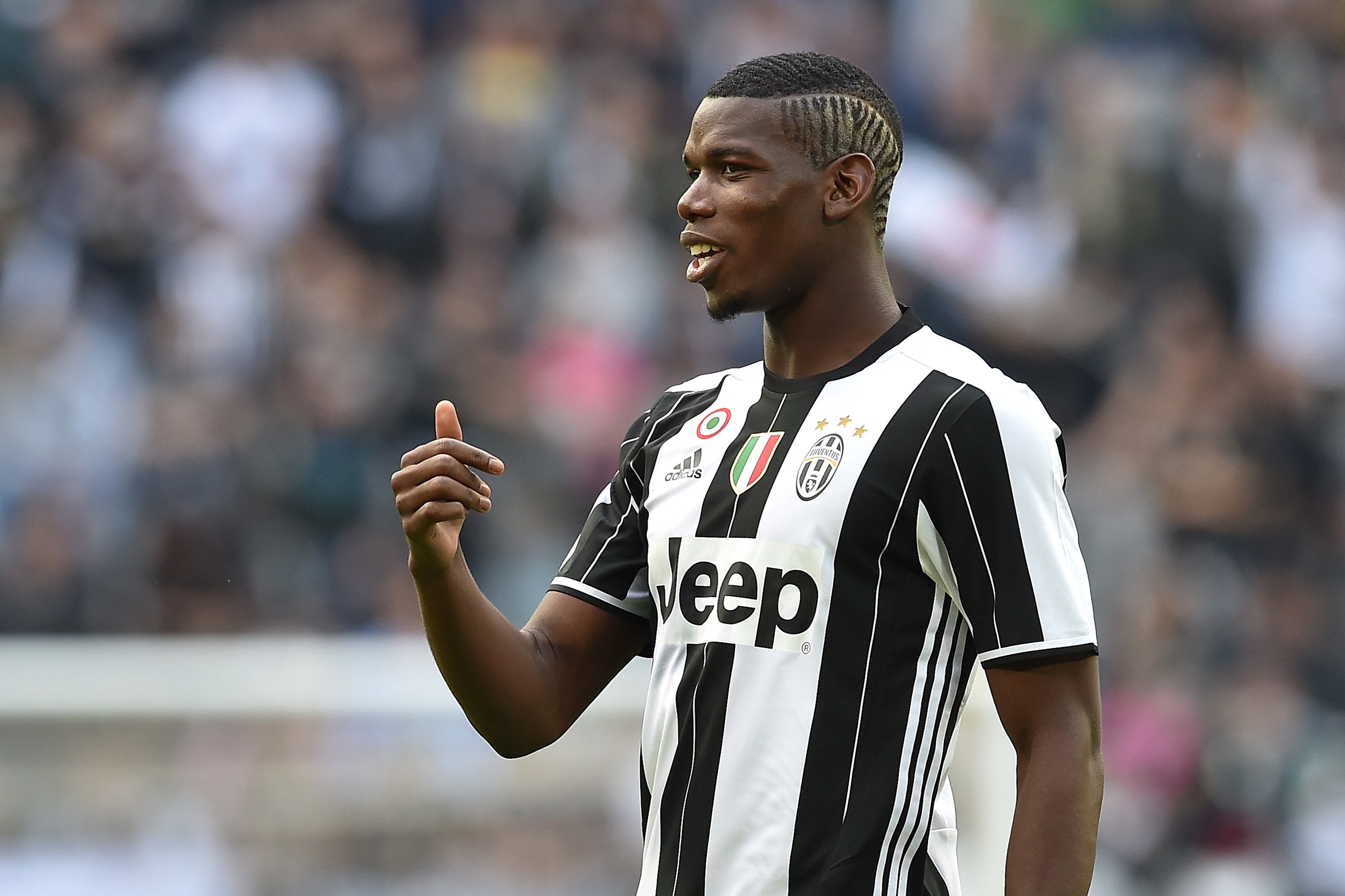 TURIN, ITALY - MAY 14: Paul Pogba of Juventus FC looks on during the Serie A match between Juventus FC and UC Sampdoria at Juventus Arena on May 14, 2016 in Turin, Italy. (Photo by Valerio Pennicino/Getty Images)