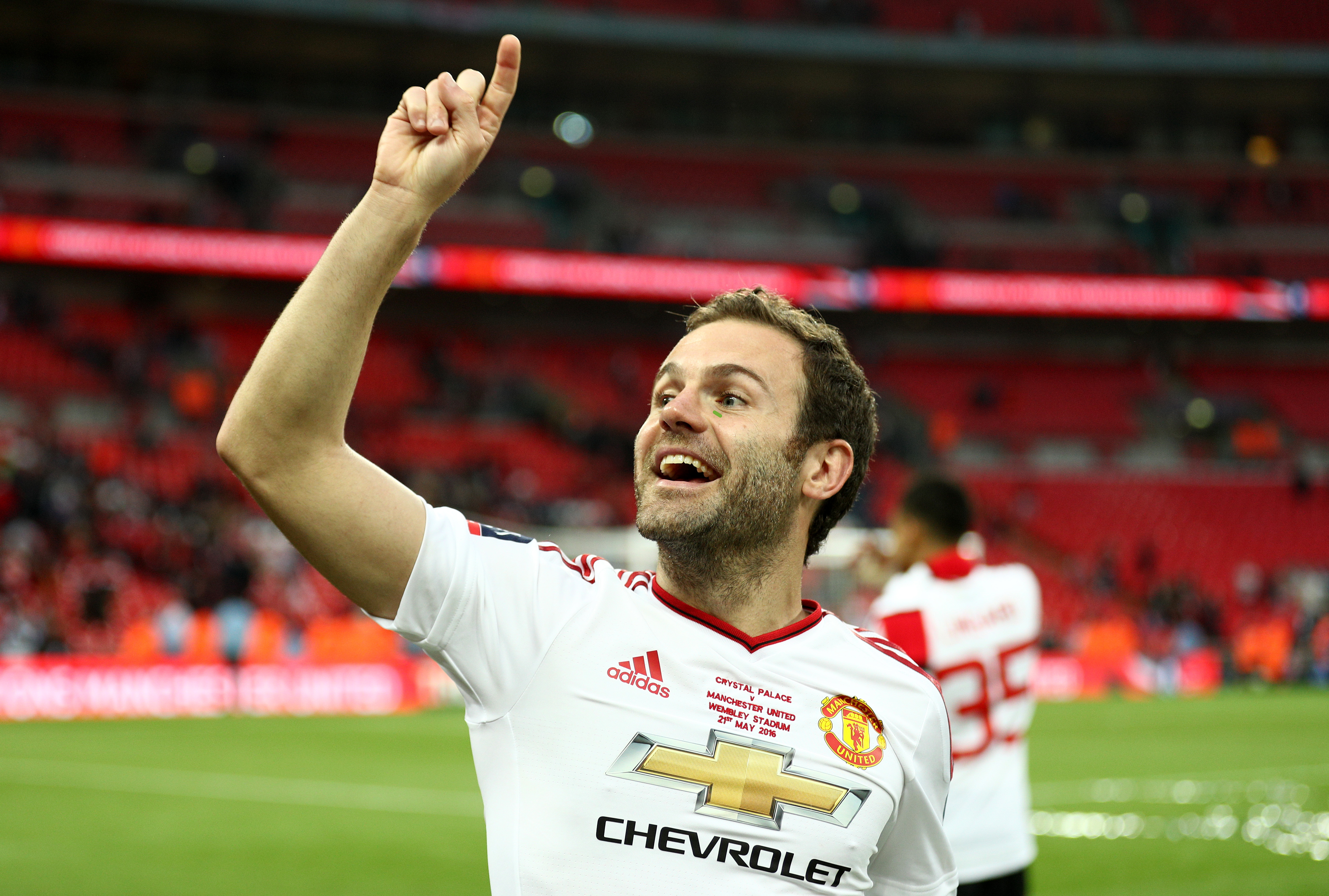 LONDON, ENGLAND - MAY 21: Juan Mata of Manchester United celebrates victory on the pitch after The Emirates FA Cup Final match between Manchester United and Crystal Palace at Wembley Stadium on May 21, 2016 in London, England. (Photo by Paul Gilham/Getty Images)