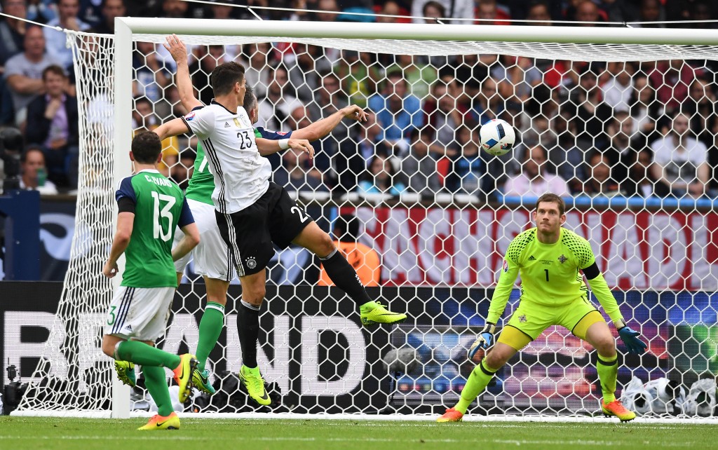 PARIS, FRANCE - JUNE 21: Mario Gomez of Germany heads at goal during the UEFA EURO 2016 Group C match between Northern Ireland and Germany at Parc des Princes on June 21, 2016 in Paris, France. (Photo by Charles McQuillan/Getty Images)