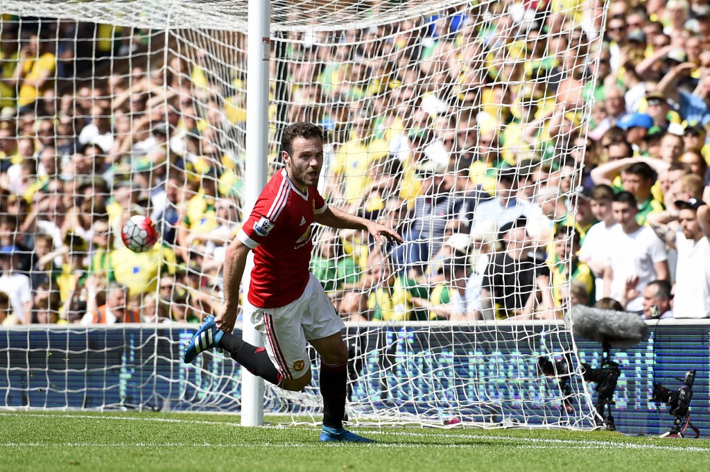 NORWICH, ENGLAND - MAY 07: Juan Mata of Manchester United celebrates scoring his team's first goal during the Barclays Premier League match between Norwich City and Manchester United at Carrow Road on May 7, 2016 in Norwich, England. (Photo by Mike Hewitt/Getty Images)