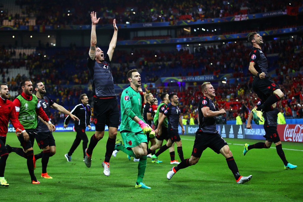 LYON, FRANCE - JUNE 19: Albania players celerbate their 1-0 win in the UEFA EURO 2016 Group A match between Romania and Albania at Stade des Lumieres on June 19, 2016 in Lyon, France. (Photo by Clive Brunskill/Getty Images)