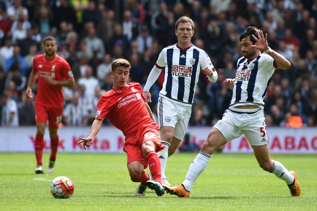 WEST BROMWICH, ENGLAND - MAY 15: Cameron Brannagan of Liverpool and Claudio Yacob of West Bromwich Albion compete for the ball during the Barclays Premier League match between West Bromwich Albion and Liverpool at The Hawthorns on May 15, 2016 in West Bromwich, England.
