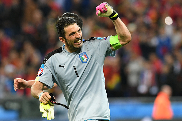 Italy's goalkeeper Gianluigi Buffon celebrate after winning the Euro 2016 group E football match against Belgium at the Parc Olympique Lyonnais stadium in Lyon on June 13, 2016. / AFP / VINCENZO PINTO (Photo credit should read VINCENZO PINTO/AFP/Getty Images)