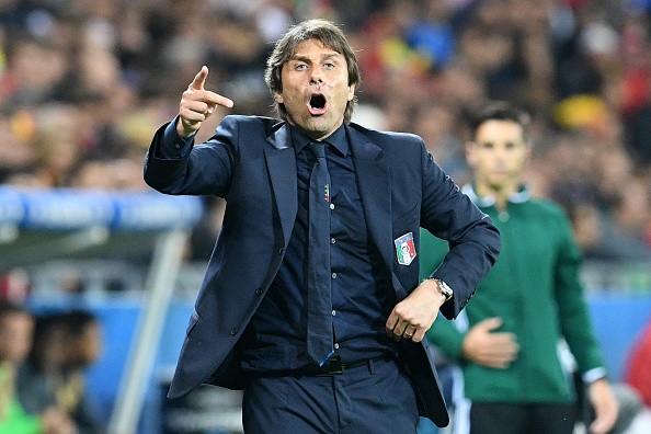 Italy's coach Antonio Conte has a nose bleed during the Euro 2016 group E football match between Belgium and Italy at the Parc Olympique Lyonnais stadium in Lyon on June 13, 2016. / AFP / VINCENZO PINTO (Photo credit should read VINCENZO PINTO/AFP/Getty Images)