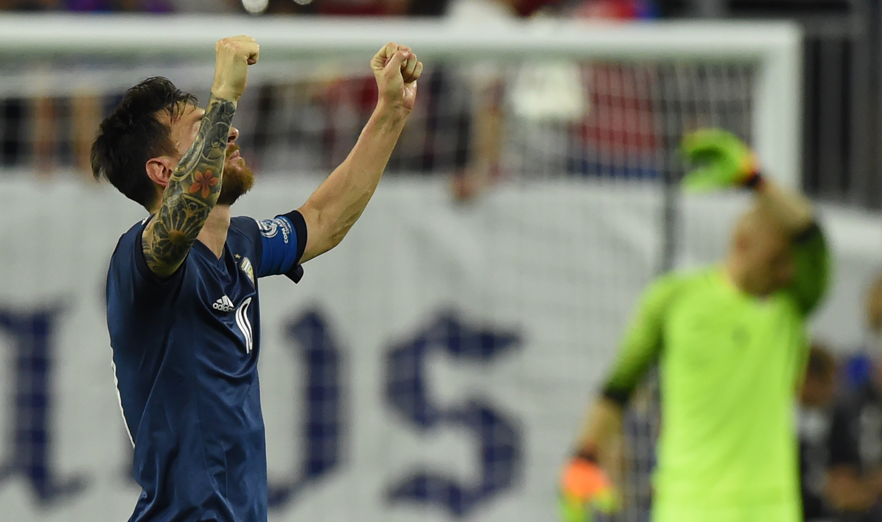 Argentina's Lionel Messi celebrates after scoring against USA during their Copa America Centenario semifinal football match in Houston, Texas, United States, on June 21, 2016.  / AFP / Mark RALSTON        (Photo credit should read MARK RALSTON/AFP/Getty Images)
