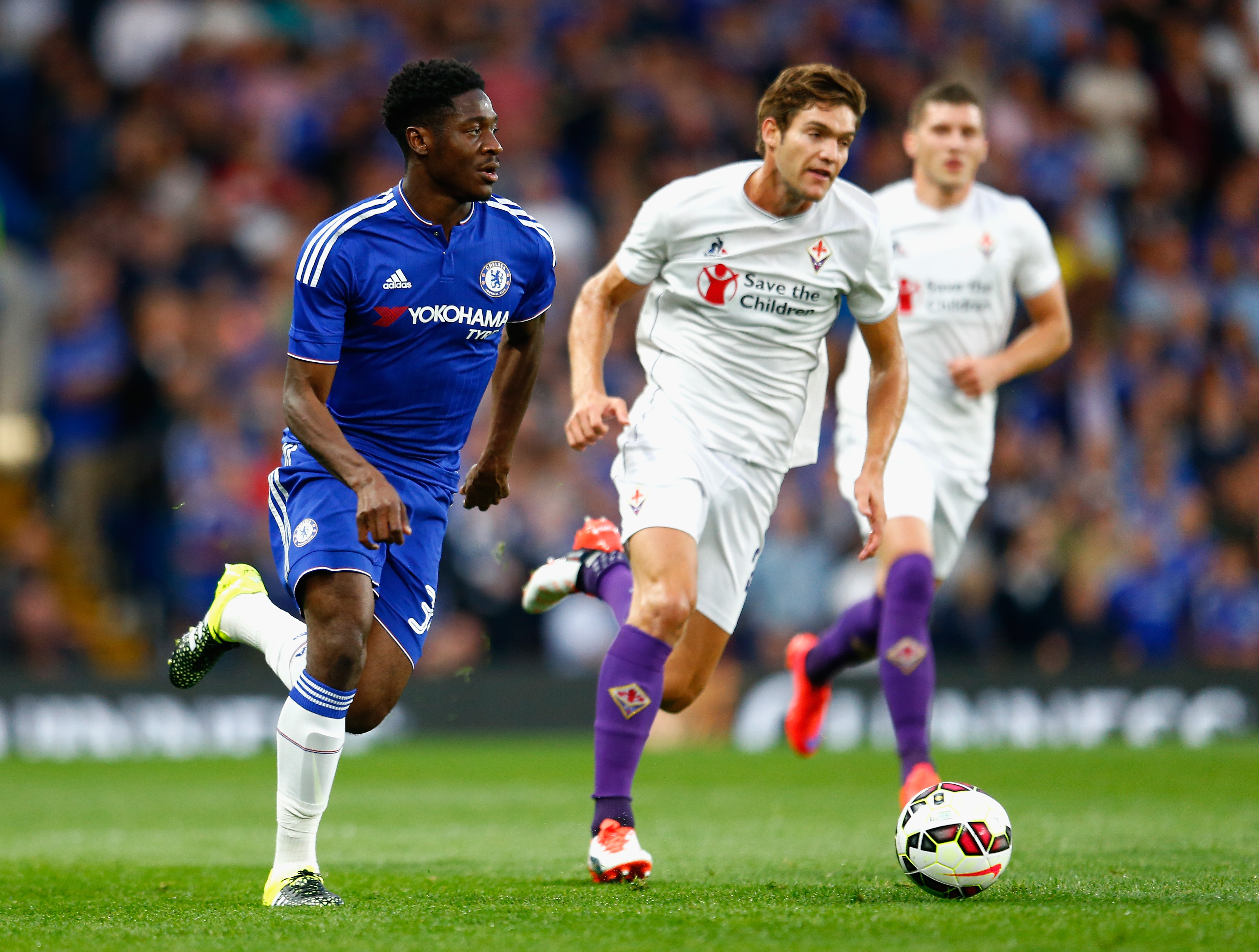 LONDON, ENGLAND - AUGUST 05:  Ola Aina of Chelsea runs past Marcos Alonso of Fiorentina during the Pre Season Friendly match between Chelsea and Fiorentina at Stamford Bridge on August 5, 2015 in London, England.  (Photo by Julian Finney/Getty Images)