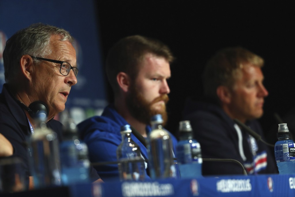 PARIS, FRANCE - JULY 02: In this handout image provided by UEFA Aron Gunnarsson and coaches Lars Lagerback and Heimir Hallgrimsson of Iceland attend a press conference at Stade de France on July 2, 2016 in Paris, France. (Photo by Handout/UEFA via Getty Images)