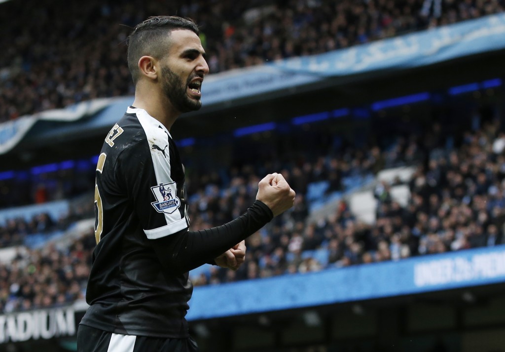 Leicester City's Algerian midfielder Riyad Mahrez celebrates after scoring his team's second goal during the English Premier League football match between Manchester City and Leicester City at the Etihad Stadium in Manchester, north west England, on February 6, 2016. / AFP / ADRIAN DENNIS / RESTRICTED TO EDITORIAL USE. No use with unauthorized audio, video, data, fixture lists, club/league logos or 'live' services. Online in-match use limited to 75 images, no video emulation. No use in betting, games or single club/league/player publications. / (Photo credit should read ADRIAN DENNIS/AFP/Getty Images)