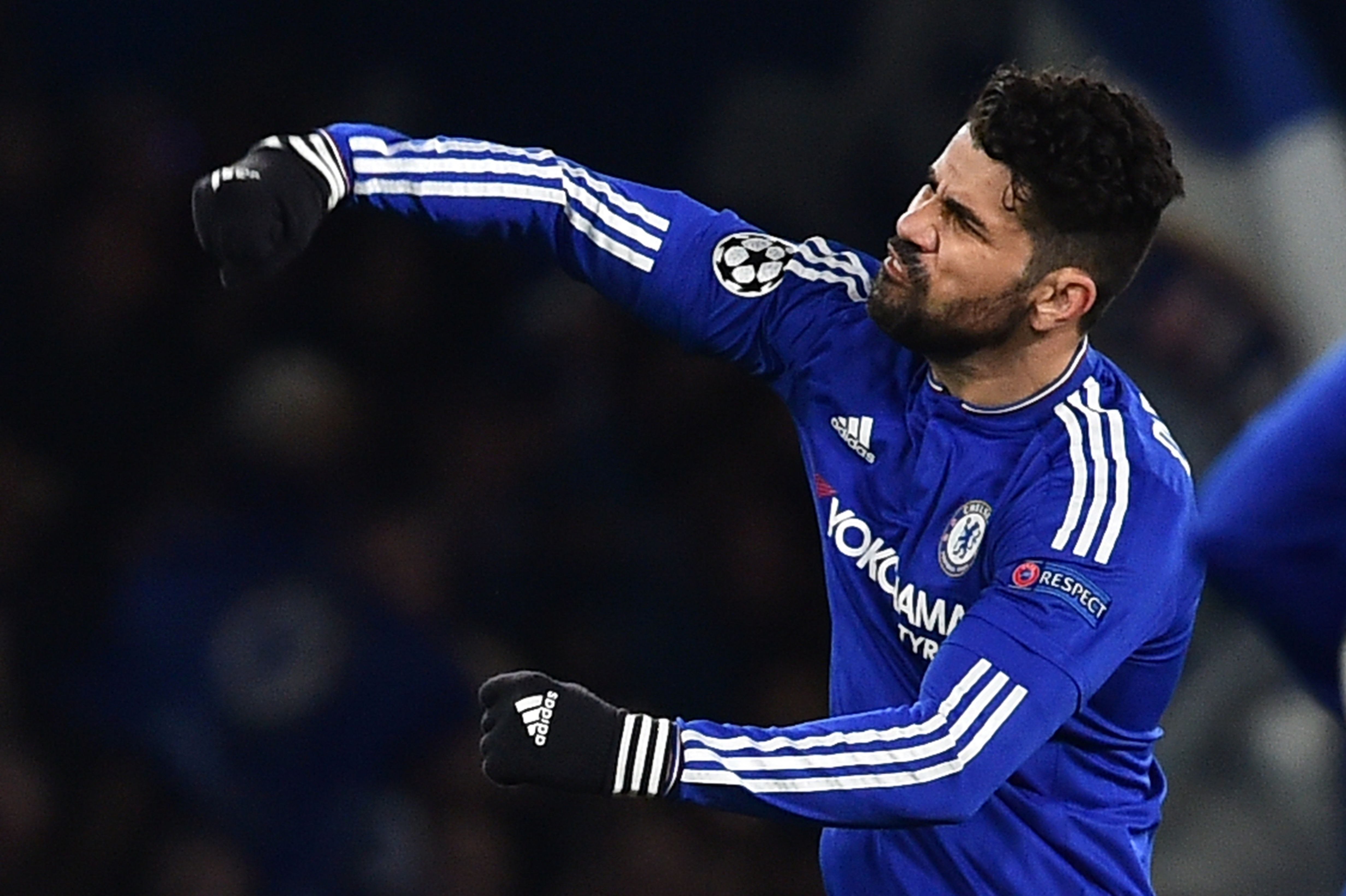 Chelsea's Brazilian-born Spanish striker Diego Costa celebrates scoring their first goal to equalise 1-1 during the UEFA Champions League round of 16 second leg football match between Chelsea and Paris Saint-Germain (PSG) at Stamford Bridge in London on March 9, 2016. / AFP / BEN STANSALL (Photo credit should read BEN STANSALL/AFP/Getty Images)
