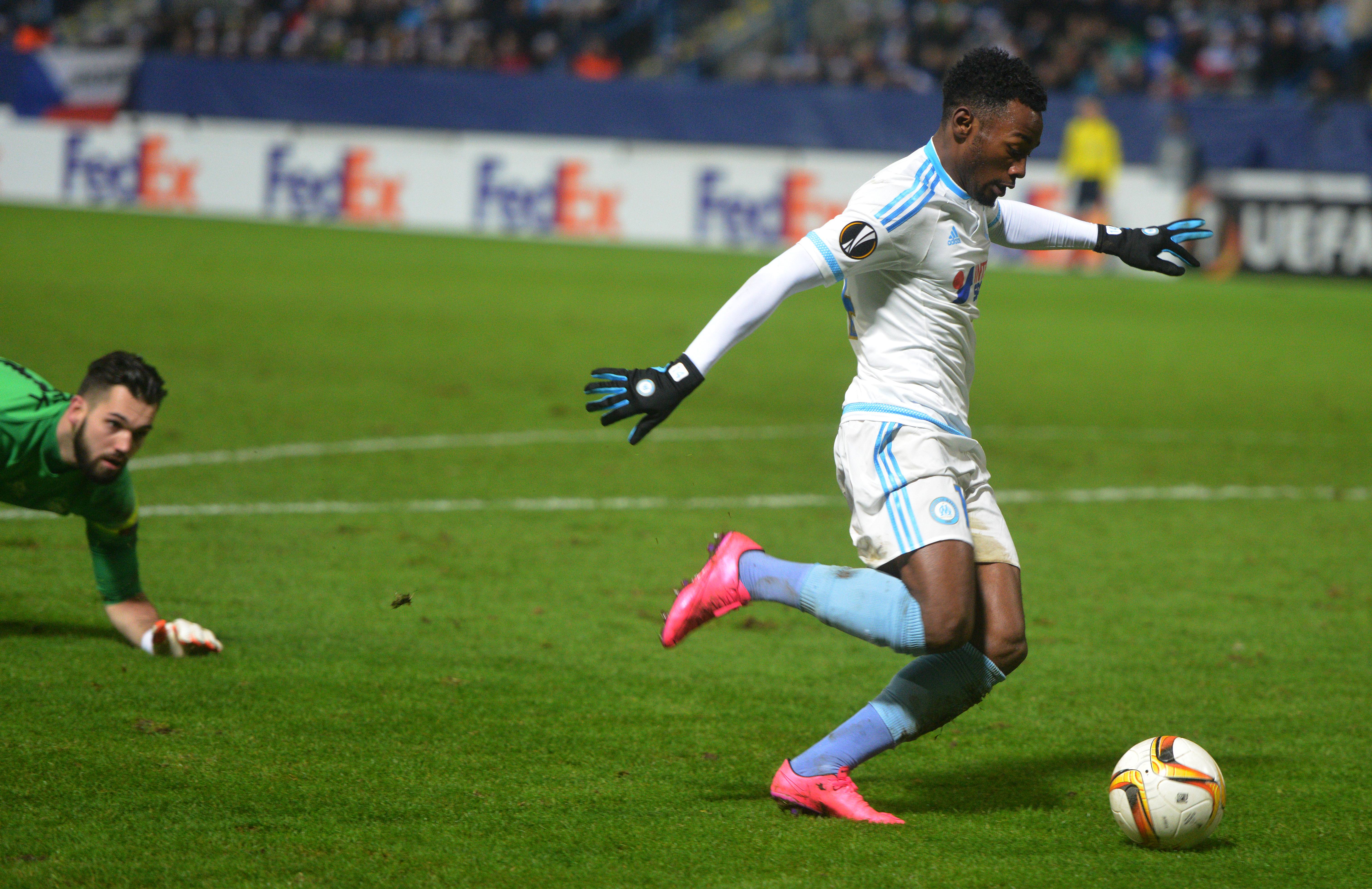 Tomas Koubek, goalkeeper of FC Slovan Liberec (L) looks at Georges-Kevin N'Koudou of Olympique de Marseille scores during the UEFA Europa League football match between FC Slovan Liberec and Olympique de Marseille in Liberec on December 10, 2015. AFP PHOTO / MICHAL CIZEK / AFP / MICHAL CIZEK (Photo credit should read MICHAL CIZEK/AFP/Getty Images)