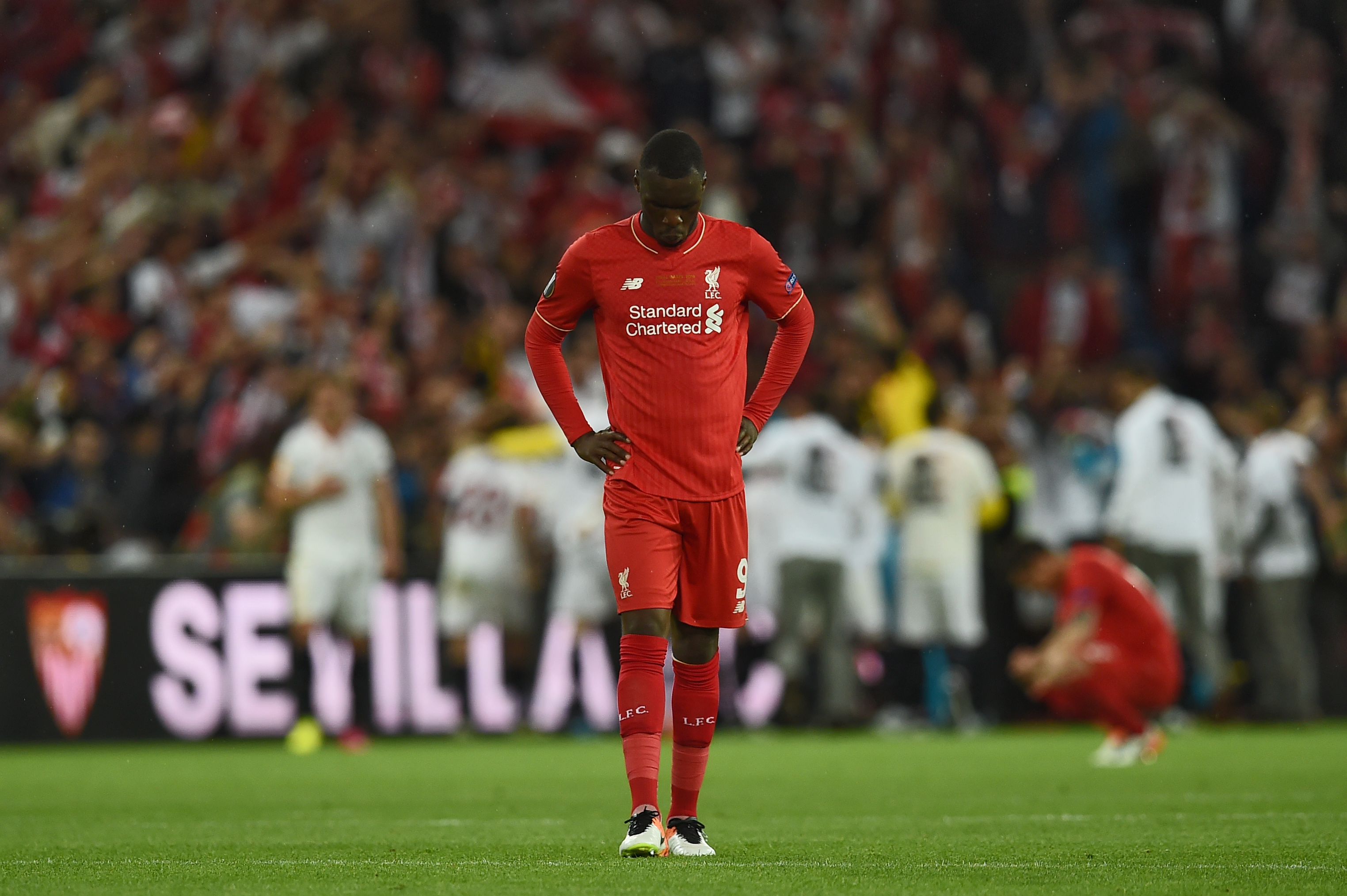 Liverpool's Belgian forward Christian Benteke reacts after losing the UEFA Europa League final football match between Liverpool FC and Sevilla FC at the St Jakob-Park stadium in Basel, on May 18, 2016. AFP PHOTO / PAUL ELLIS / AFP / PAUL ELLIS (Photo credit should read PAUL ELLIS/AFP/Getty Images)