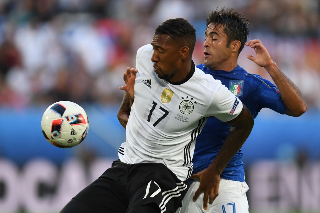 Germany's defender Jerome Boateng (L) vies wirh Italy's forward Citadin Martins Ederduring the Euro 2016 quarter-final football match between Germany and Italy at the Matmut Atlantique stadium in Bordeaux on July 2, 2016. / AFP / PATRIK STOLLARZ (Photo credit should read PATRIK STOLLARZ/AFP/Getty Images)