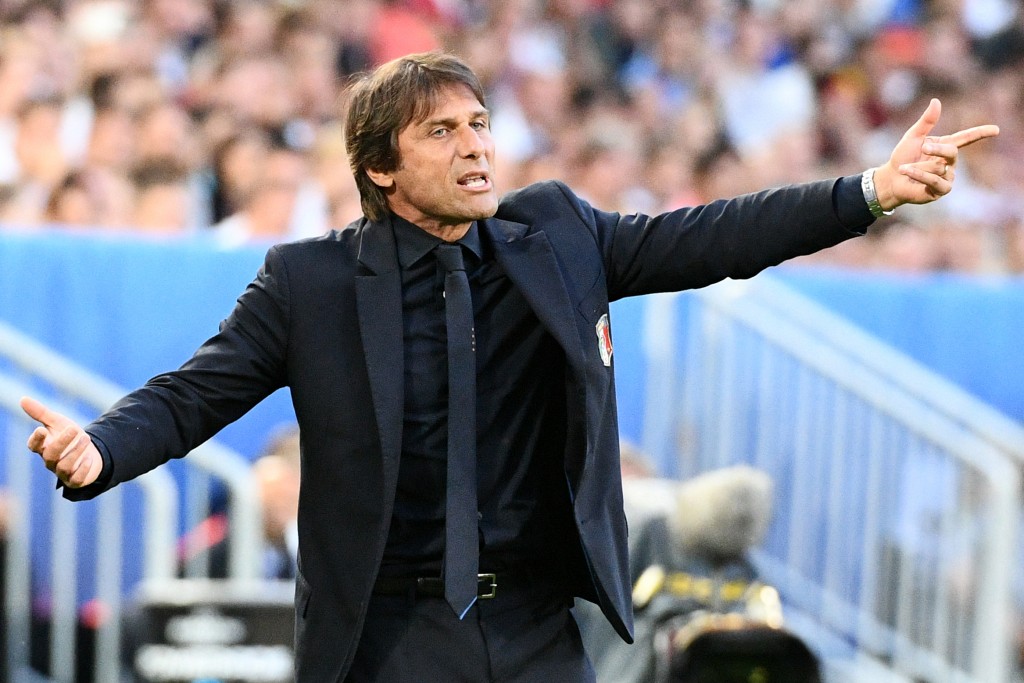 Italy's coach Antonio Conte reacts during the Euro 2016 quarter-final football match between Germany and Italy at the Matmut Atlantique stadium in Bordeaux on July 2, 2016. / AFP / VINCENZO PINTO (Photo credit should read VINCENZO PINTO/AFP/Getty Images)