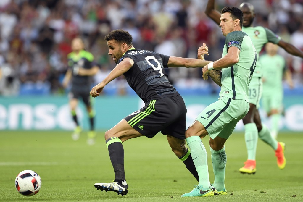 Wales' forward Hal Robson-Kanu vies for the ball against Portugal's defender Fonte during the Euro 2016 semi-final football match between Portugal and Wales at the Parc Olympique Lyonnais stadium in Décines-Charpieu, near Lyon, on July 6, 2016. / AFP / MIGUEL MEDINA (Photo credit should read MIGUEL MEDINA/AFP/Getty Images)
