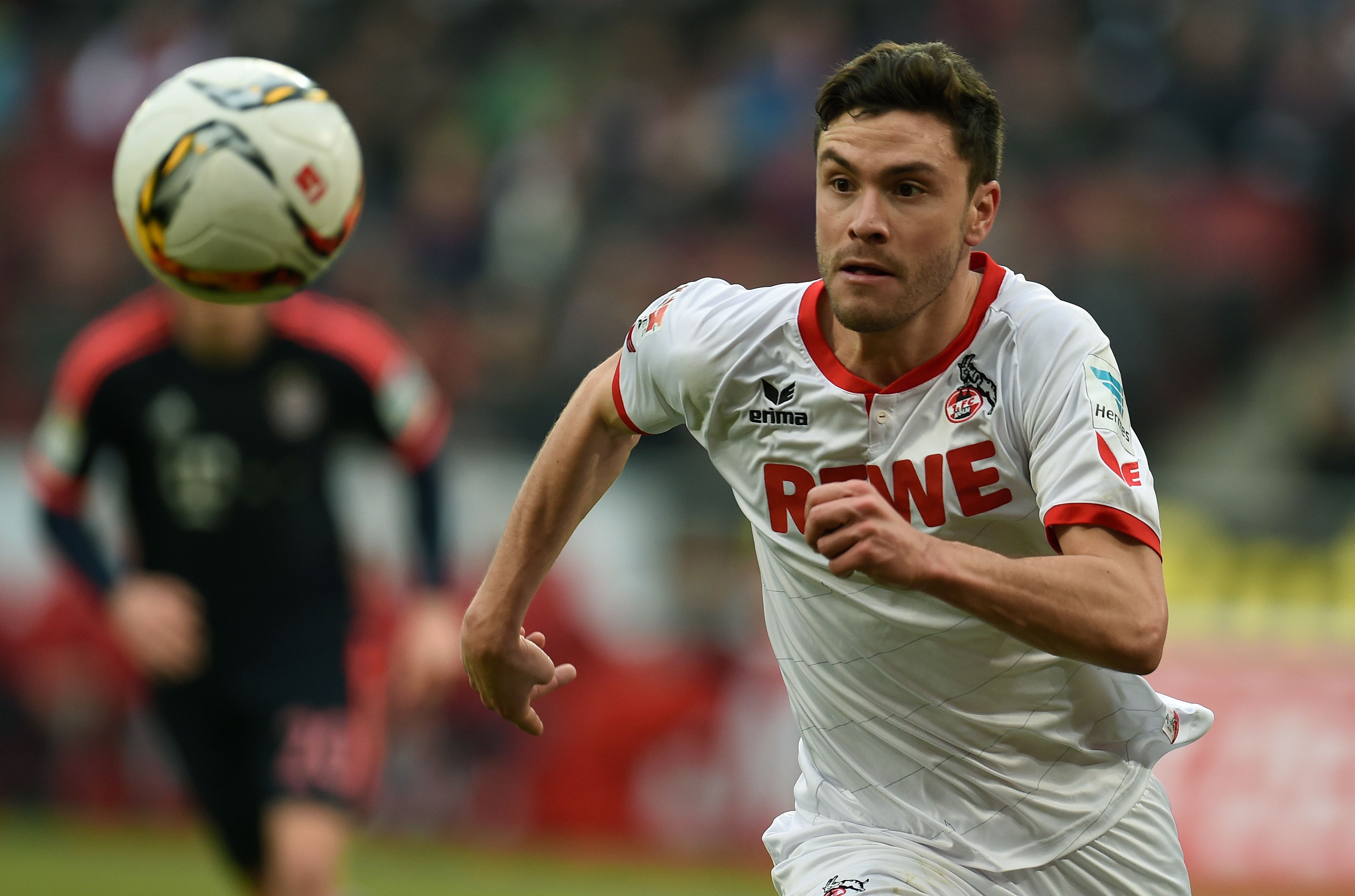 Cologne's defender Jonas Hector runs with the ball during the German Bundesliga first division football match between FC Cologne vs FC Bayern Munich in Cologne, western Germany, on March 19, 2016. / AFP / PATRIK STOLLARZ / RESTRICTIONS: DURING MATCH TIME: DFL RULES TO LIMIT THE ONLINE USAGE TO 15 PICTURES PER MATCH AND FORBID IMAGE SEQUENCES TO SIMULATE VIDEO. == RESTRICTED TO EDITORIAL USE == FOR FURTHER QUERIES PLEASE CONTACT DFL DIRECTLY AT + 49 69 650050
        (Photo credit should read PATRIK STOLLARZ/AFP/Getty Images)