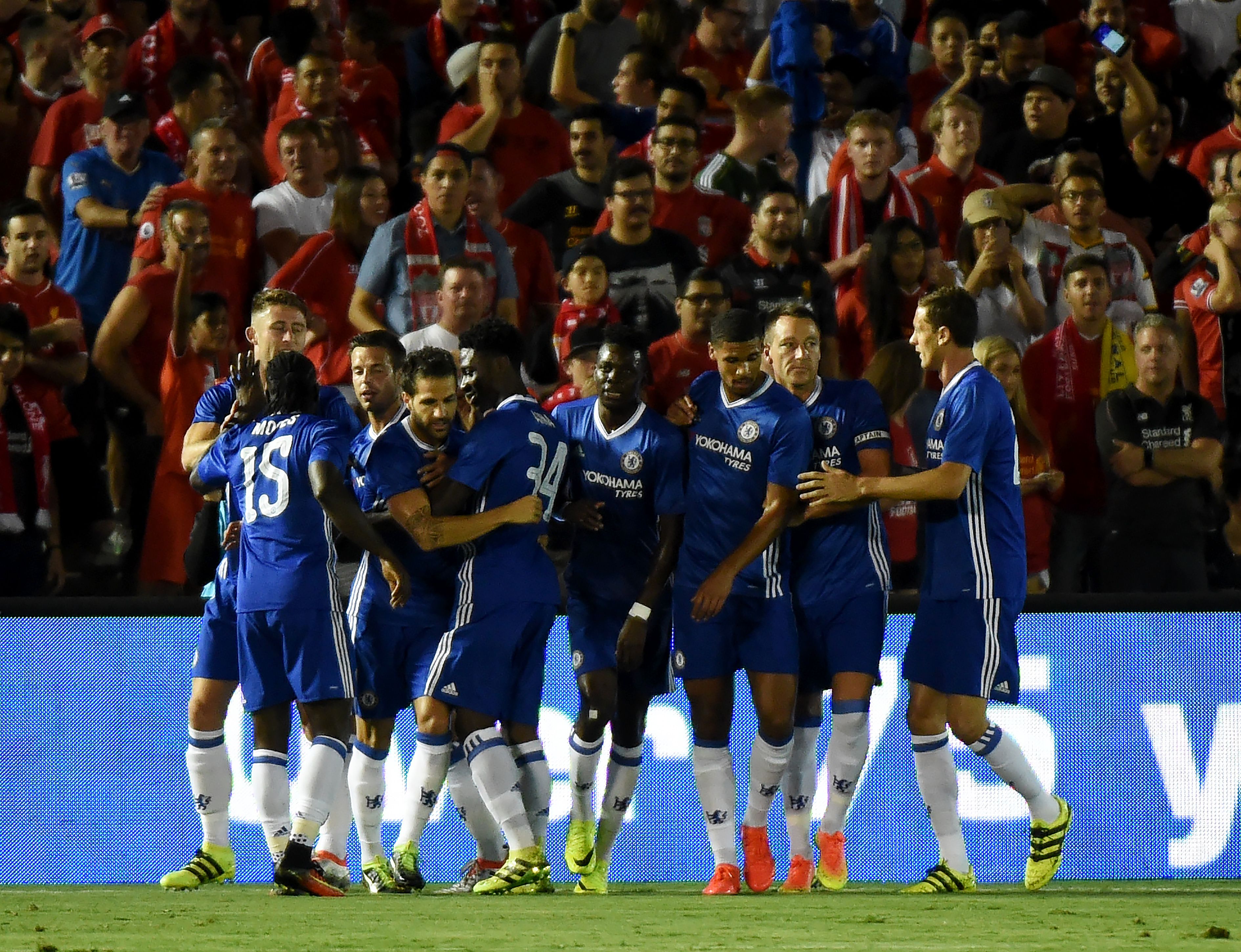 Chelsea defender Gary Cahill (4th L) celebrates with teammates after scoring a goal during their International Champions Cup (ICC) football match against Liverpool at the Rose Bowl Stadium in Pasadena, California on July 27, 2016.
Chelsea won 1-0. (Photo by Mark Ralston/AFP/Getty Images)