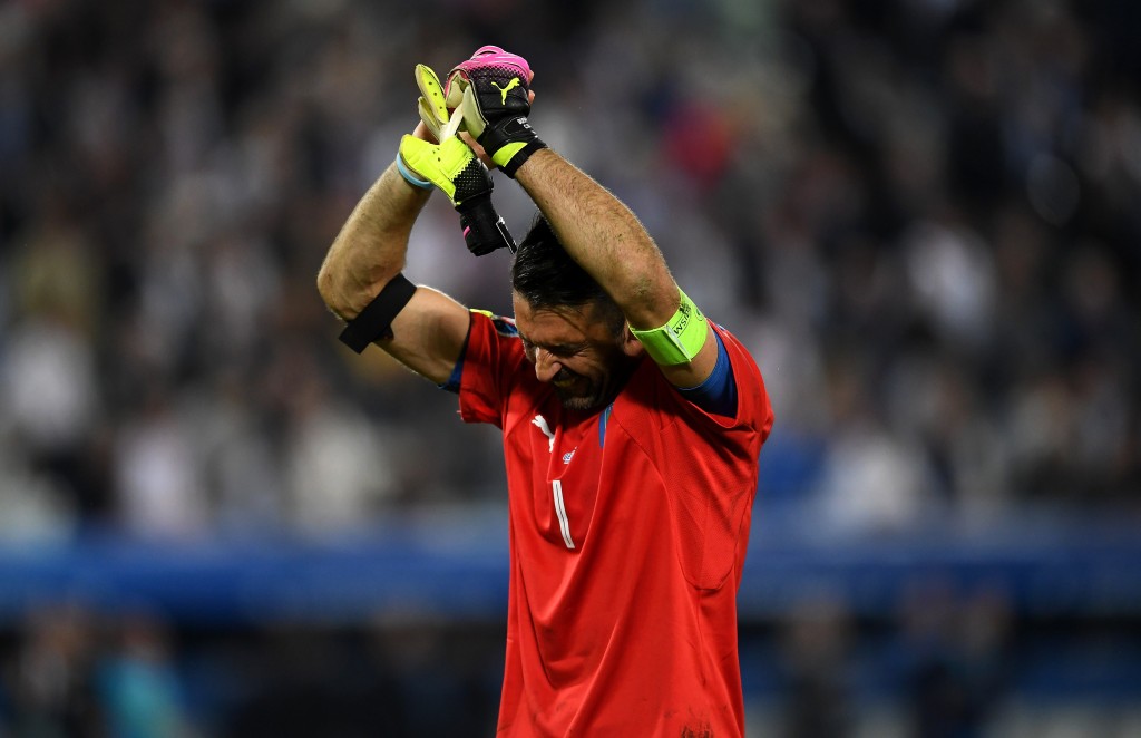 BORDEAUX, FRANCE - JULY 02: Dejected Gianluigi Buffon of Italy applauds the supporterrs after his team's defeat through the penalty shootout after the UEFA EURO 2016 quarter final match between Germany and Italy at Stade Matmut Atlantique on July 2, 2016 in Bordeaux, France. (Photo by Laurence Griffiths/Getty Images)