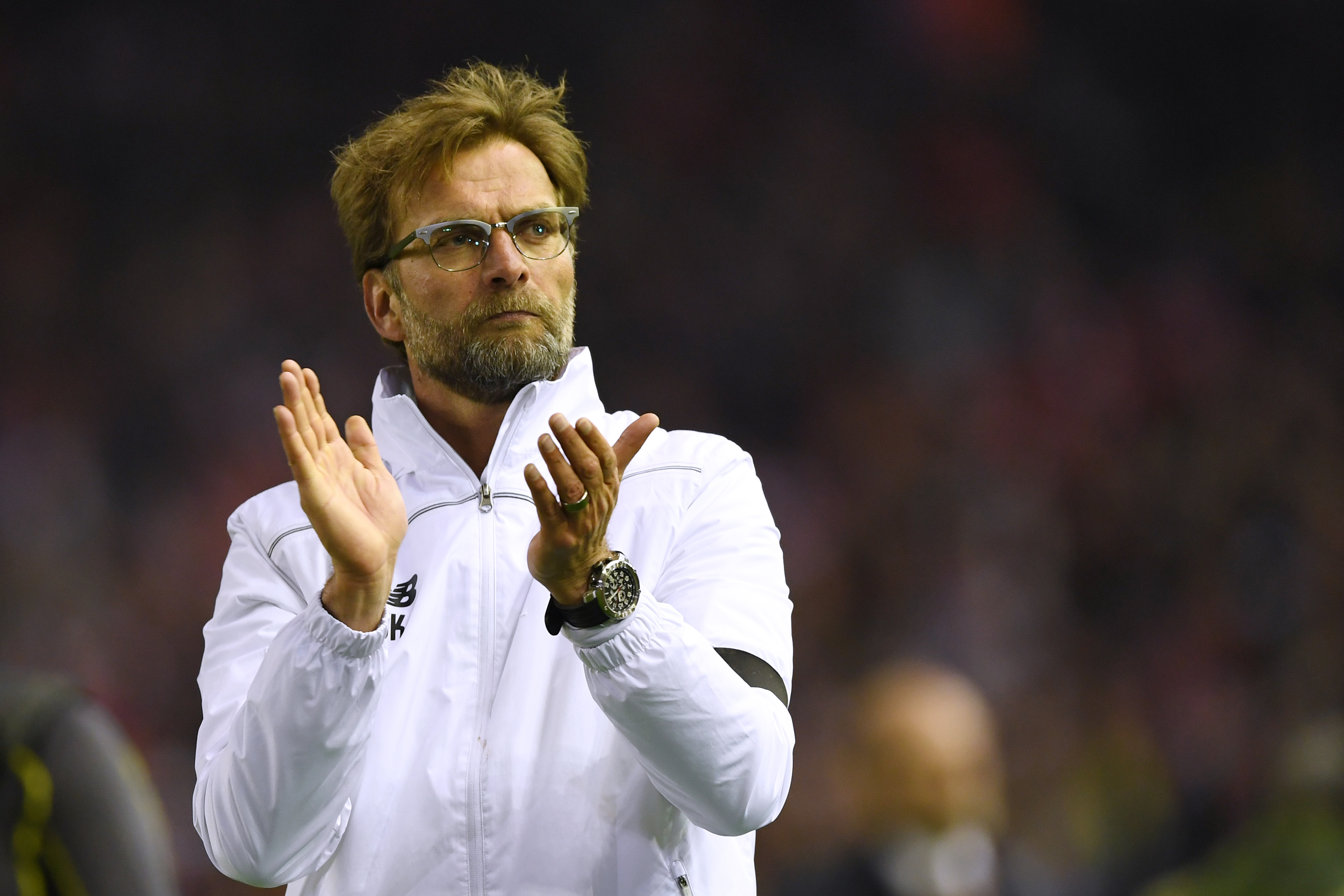 LIVERPOOL, ENGLAND - APRIL 14:  Jurgen Klopp, manager of Liverpool celebrates victory after the UEFA Europa League quarter final, second leg match between Liverpool and Borussia Dortmund at Anfield on April 14, 2016 in Liverpool, United Kingdom.  (Photo by Shaun Botterill/Getty Images)