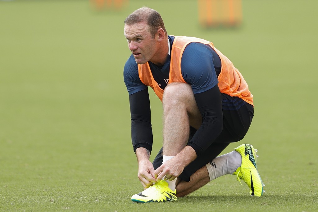SHANGHAI, CHINA - JULY 21: Wayne Rooney of Manchester United looks on during the team training session as part of their pre-season tour of China at Shanghai Stadium on July 21, 2016 in Shanghai, China. (Photo by Lintao Zhang/Getty Images)