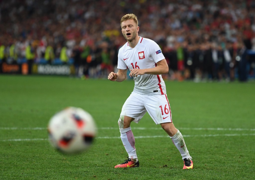 MARSEILLE, FRANCE - JUNE 30: Jakub Blaszczykowski of Poland reacts after the penalty saved by Rui Patricio of Portugal at the penalty shootout during the UEFA EURO 2016 quarter final match between Poland and Portugal at Stade Velodrome on June 30, 2016 in Marseille, France. (Photo by Laurence Griffiths/Getty Images)