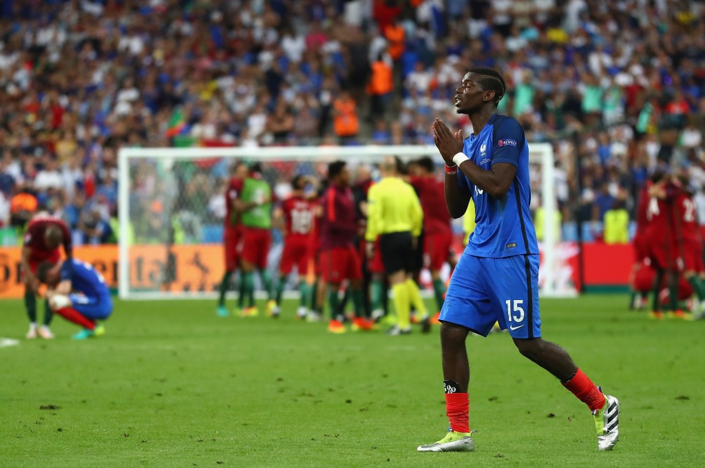 PARIS, FRANCE - JULY 10: Paul Pogba of France shows his dejection after his team's 0-1 defeat in the UEFA EURO 2016 Final match between Portugal and France at Stade de France on July 10, 2016 in Paris, France. (Photo by Lars Baron/Getty Images)
