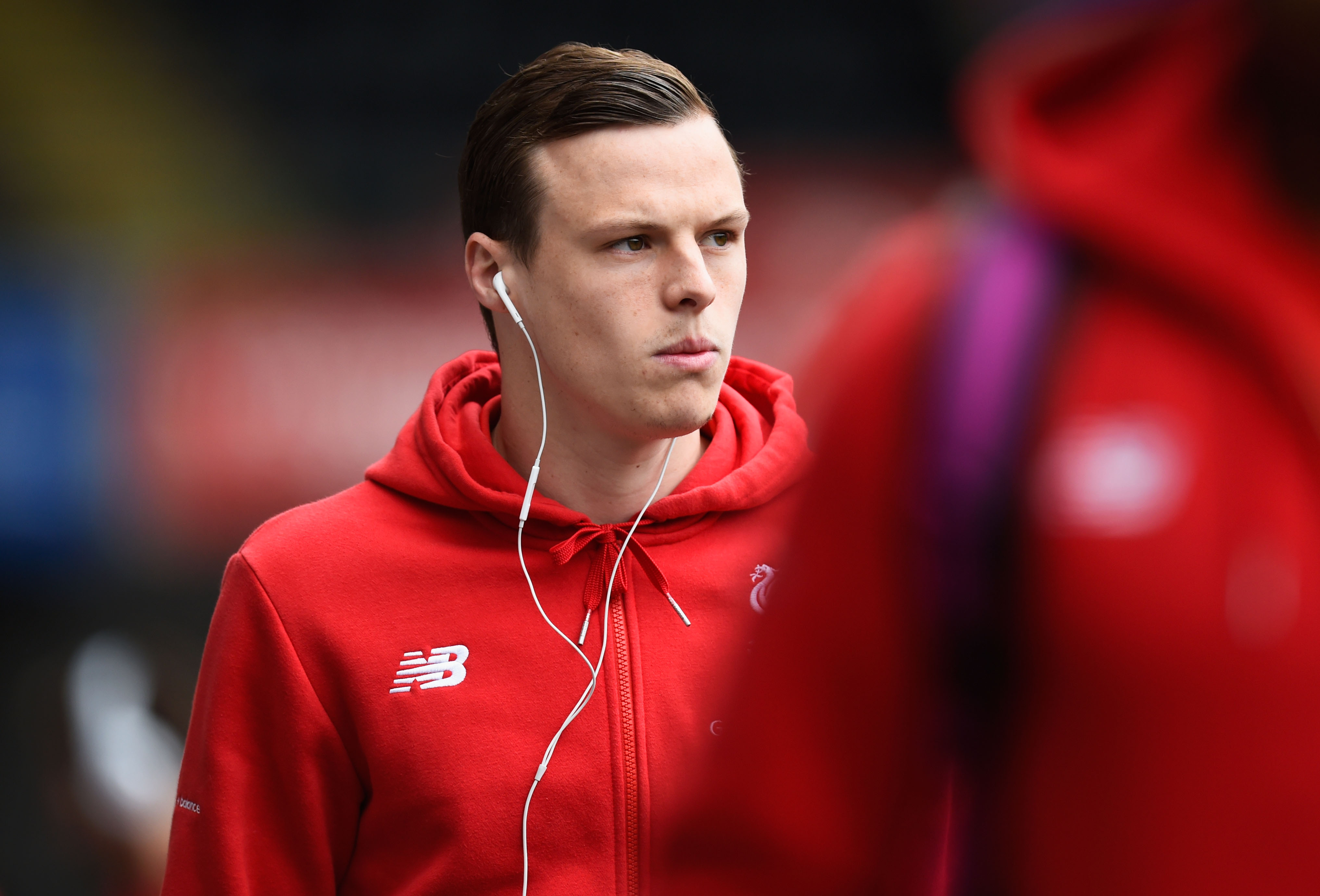 SWANSEA, WALES - MAY 01: Brad Smith of Liverpool arrives for the Barclays Premier League match between Swansea City and Liverpool at The Liberty Stadium on May 1, 2016 in Swansea, Wales. (Photo by Stu Forster/Getty Images)