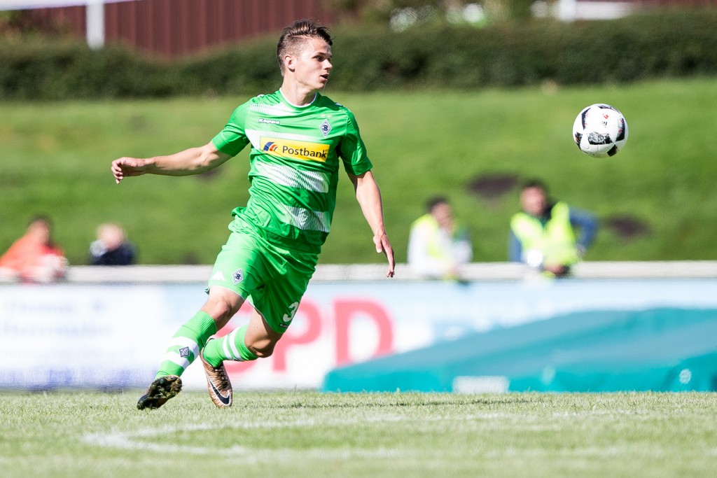 RHEDE, GERMANY - JULY 02: Andreas Christensen of Borussia Moenchengladbach with ball during the friendly match between VfL Rhede and Borussia Moenchengladbach at Besagroup Sportpark on July 2, 2016 in Rhede, Germany. (Photo by Maja Hitij/Bongarts/Getty Images)