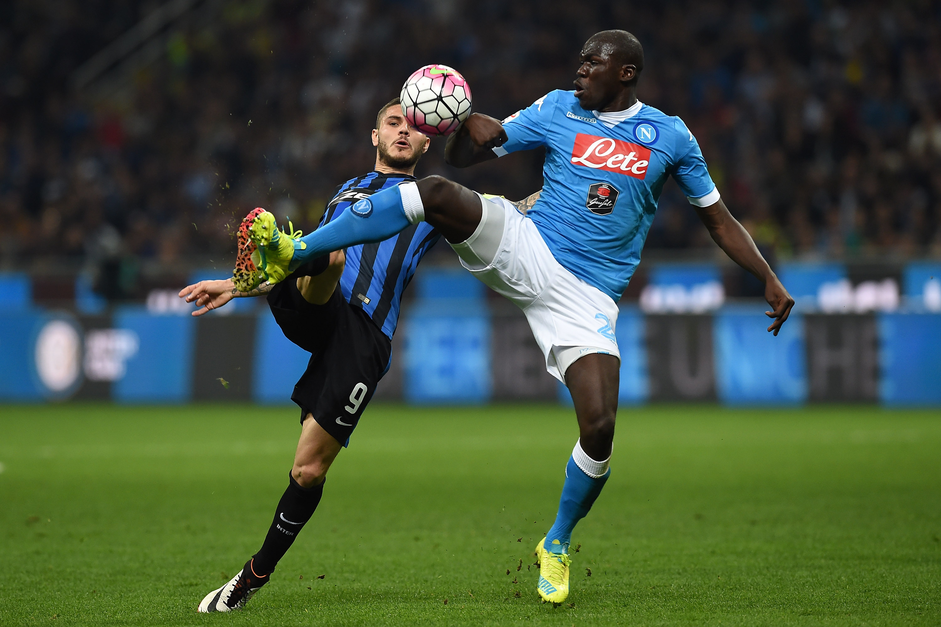 MILAN, ITALY - APRIL 16: Mauro Icardi (L) of FC Internazionale Milano is challenged by Kalidou Koulibaly of SSC Napoli during the Serie A match between FC Internazionale Milano and SSC Napoli at Stadio Giuseppe Meazza on April 16, 2016 in Milan, Italy. (Photo by Valerio Pennicino/Getty Images)