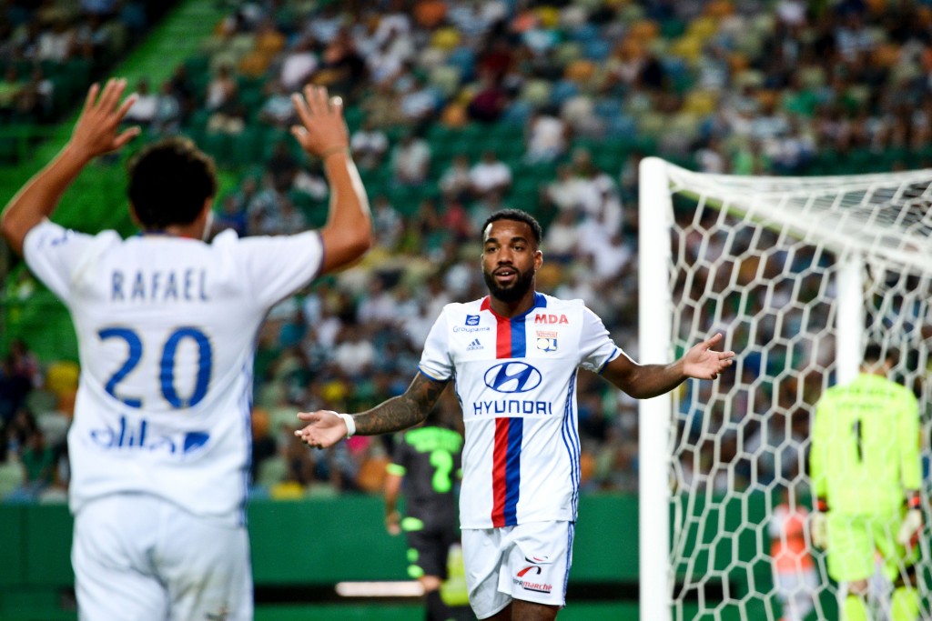 Olympique Lyon's forward Alexandre Lacazette (C) celebrates a goal during the friendly football match Sporting CP vs Olympique de Lyonnais at the Jose Alvalade stadium in Lisbon on July 23, 2016. / AFP / PATRICIA DE MELO MOREIRA (Photo credit should read PATRICIA DE MELO MOREIRA/AFP/Getty Images)
