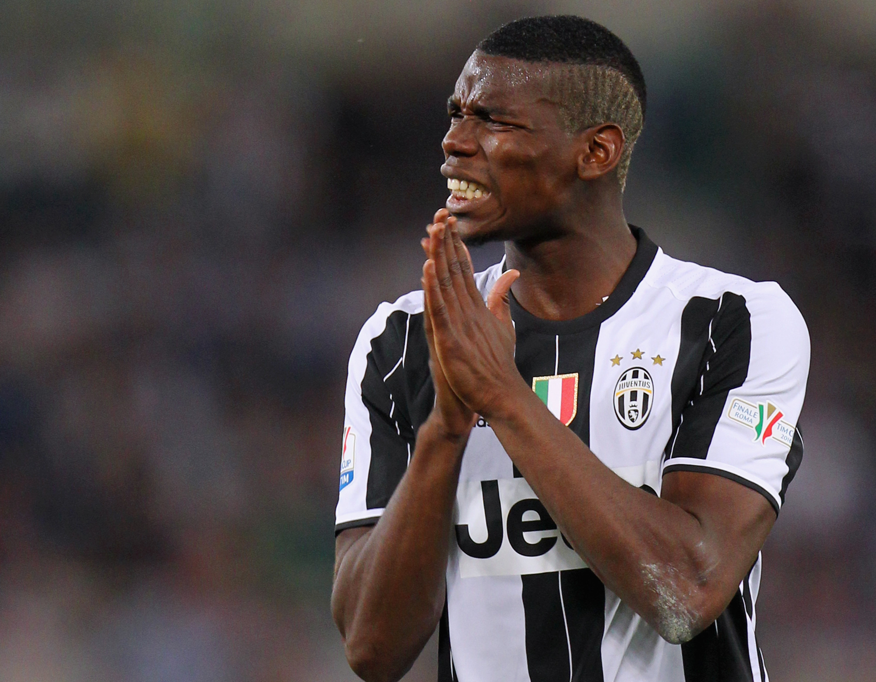 ROME, ITALY - MAY 21: Paul Pogba of Juventus FC reacts during the TIM Cup final match between AC Milan and Juventus FC at Stadio Olimpico on May 21, 2016 in Rome, Italy. (Photo by Paolo Bruno/Getty Images)