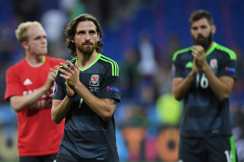 Wales' midfielder Joe Allen reacts at the end of the Euro 2016 semi-final football match between Portugal and Wales at the Parc Olympique Lyonnais stadium in Décines-Charpieu, near Lyon, on July 6, 2016. / AFP / PAUL ELLIS (Photo credit should read PAUL ELLIS/AFP/Getty Images)