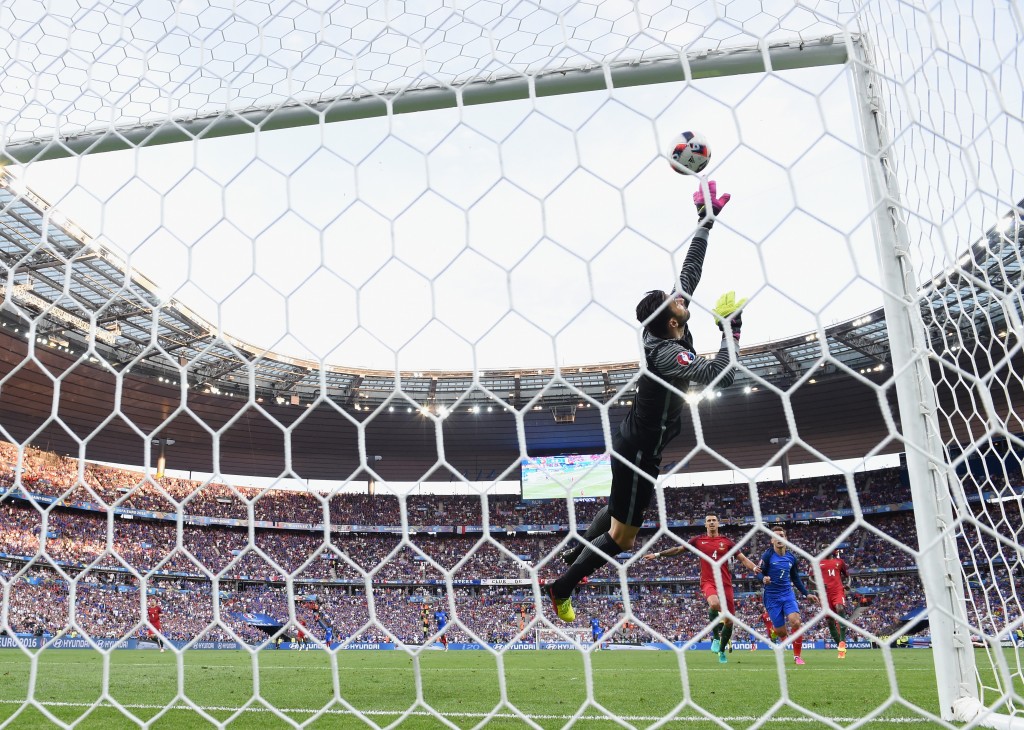 PARIS, FRANCE - JULY 10: Rui Patricio of Portugal makes a save the UEFA EURO 2016 Final match between Portugal and France at Stade de France on July 10, 2016 in Paris, France. (Photo by Matthias Hangst/Getty Images)