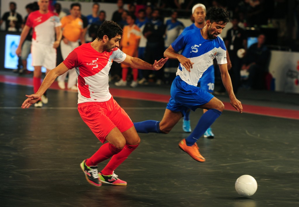 Michael (R) from the Goa 5's plays against Kolkata 5's Gabriel during their Premier Futsal Football League match in Chennai on July 15, 2016. / AFP / ARUN SANKAR (Photo credit should read ARUN SANKAR/AFP/Getty Images)