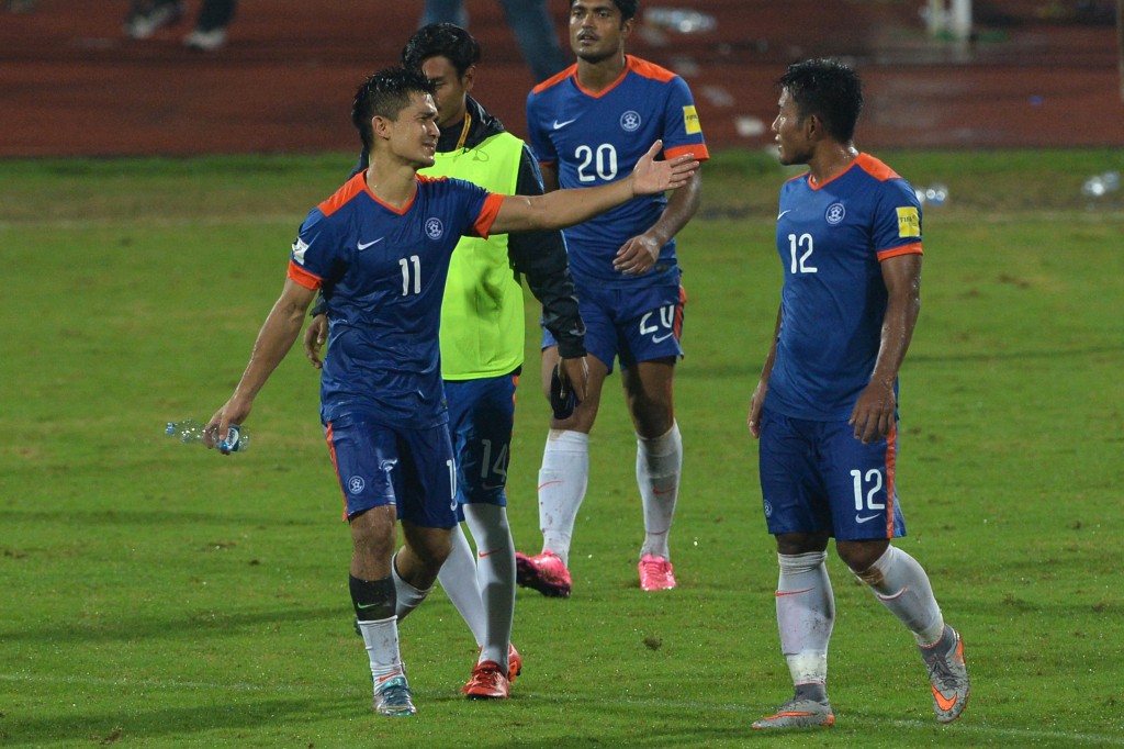 India's Sunil Chhetri (L) gestures towards teammate Je Je (R) after India won 1-0 during the the Asia Group D FIFA World Cup 2018 qualifying football match between India and Guam at The Sree KanteeraVa Stadium in Bangalore on November 12, 2015. AFP PHOTO/ Manjunath KIRAN (Photo credit should read Manjunath Kiran/AFP/Getty Images)