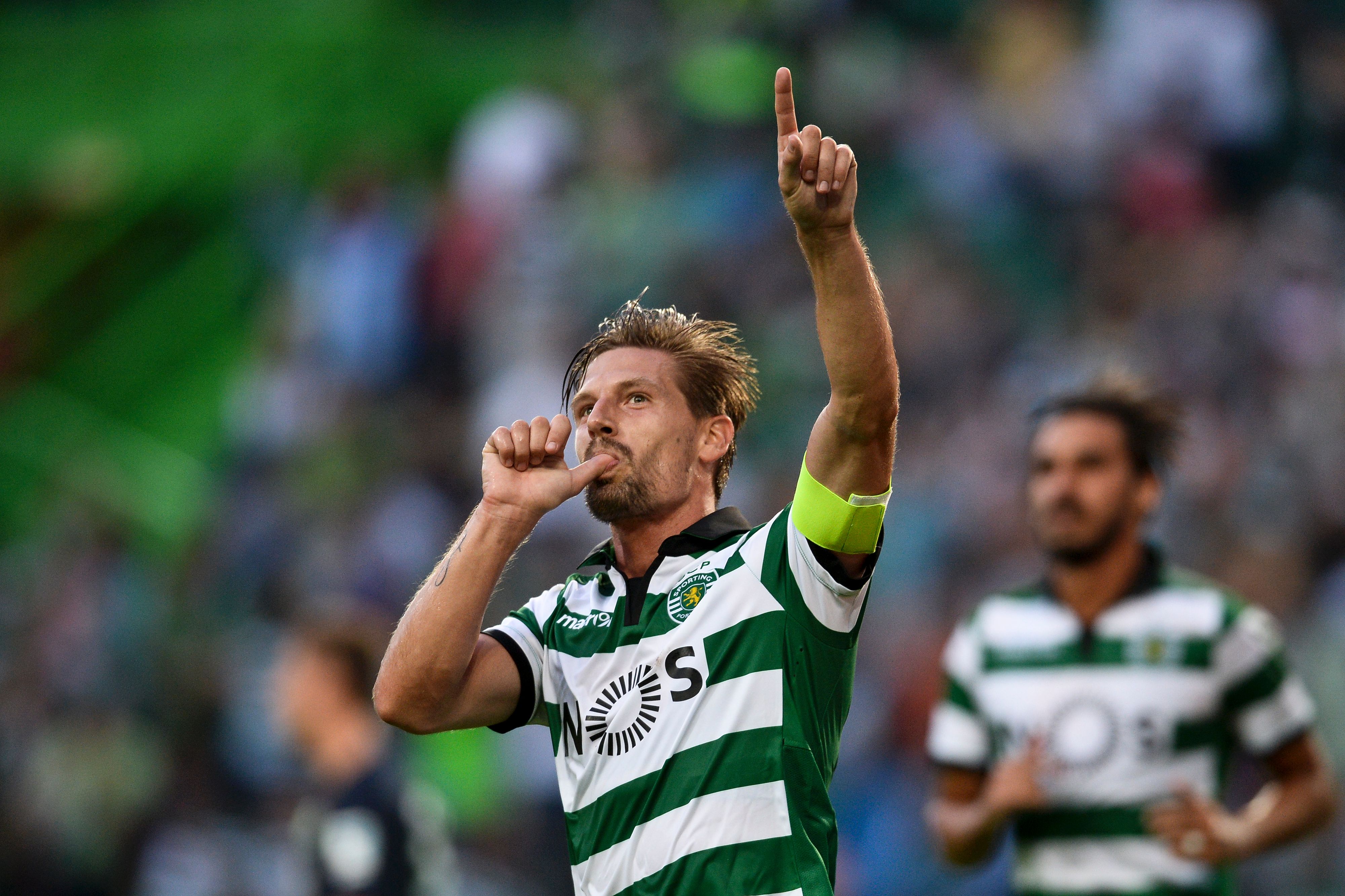 Sporting's midfielder Adrien Silva celebrates after scoring against VFL Wolfsburg during the Violinos Cup football match between Sporting CP and VFL Wolfsburg at Alvalade stadium in Lisbon on July 30, 2016. / AFP / PATRICIA DE MELO MOREIRA (Photo credit should read PATRICIA DE MELO MOREIRA/AFP/Getty Images)
