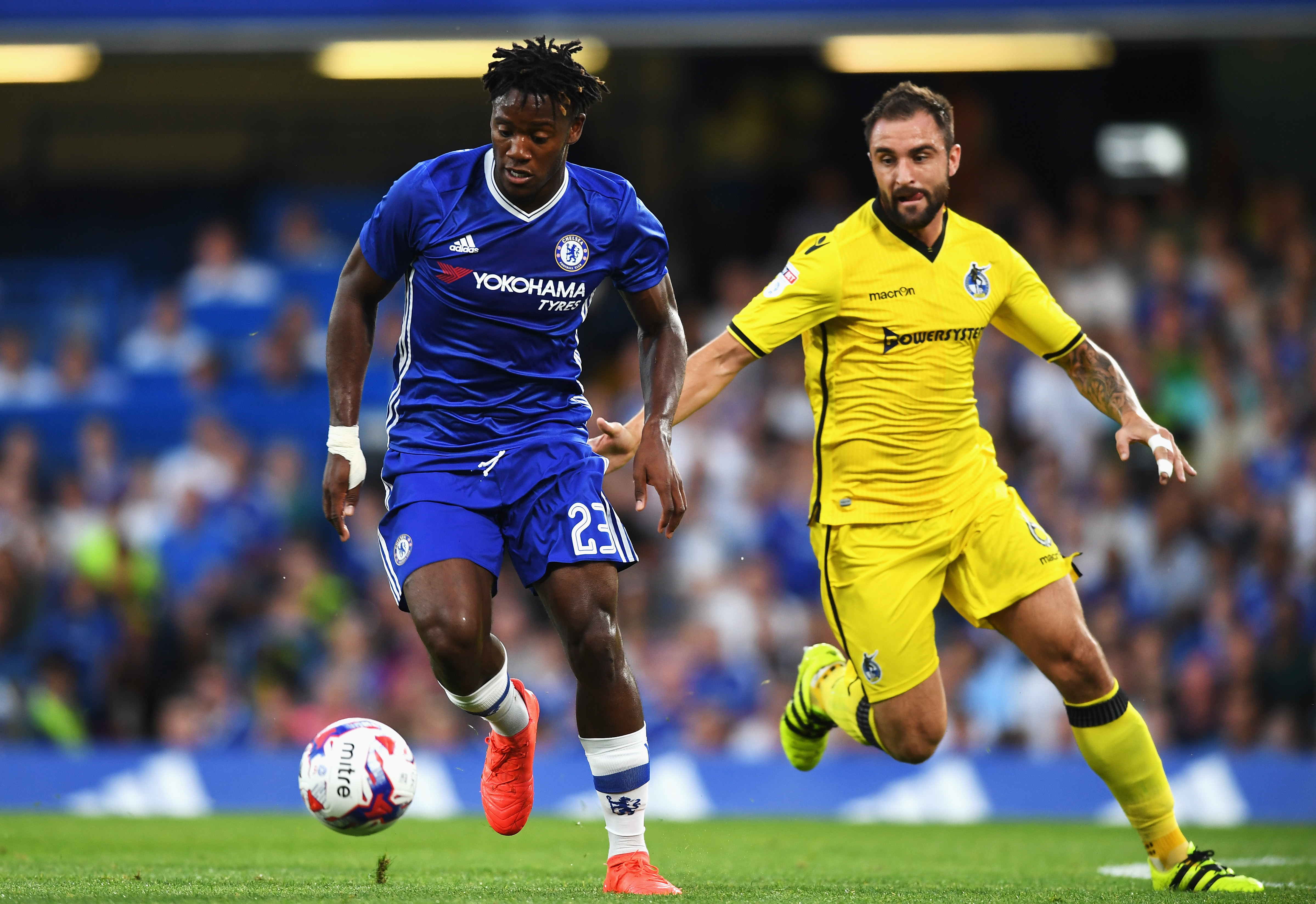 LONDON, ENGLAND - AUGUST 23: Michy Batshuayi of Chelsea is closed down by Peter Hartley of Bristol Rovers during the EFL Cup second round match between Chelsea and Bristol Rovers at Stamford Bridge on August 23, 2016 in London, England. (Photo by Michael Regan/Getty Images )