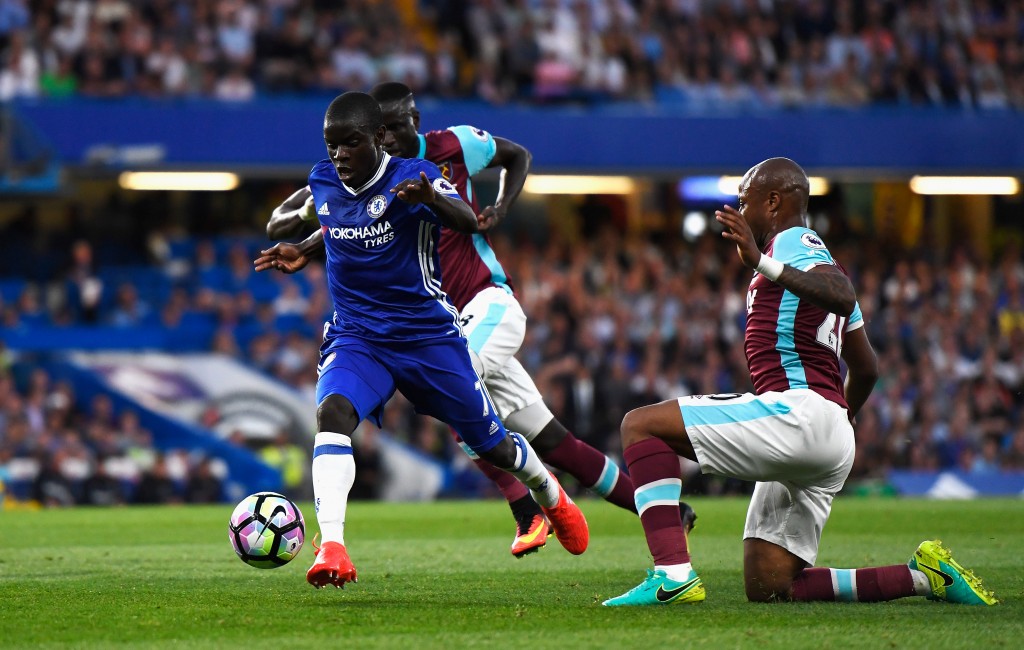LONDON, ENGLAND - AUGUST 15: N'Golo Kante of Chelsea makes a break past Andre Ayew (R) of West Ham United during the Premier League match between Chelsea and West Ham United at Stamford Bridge on August 15, 2016 in London, England. (Photo by Mike Hewitt/Getty Images)